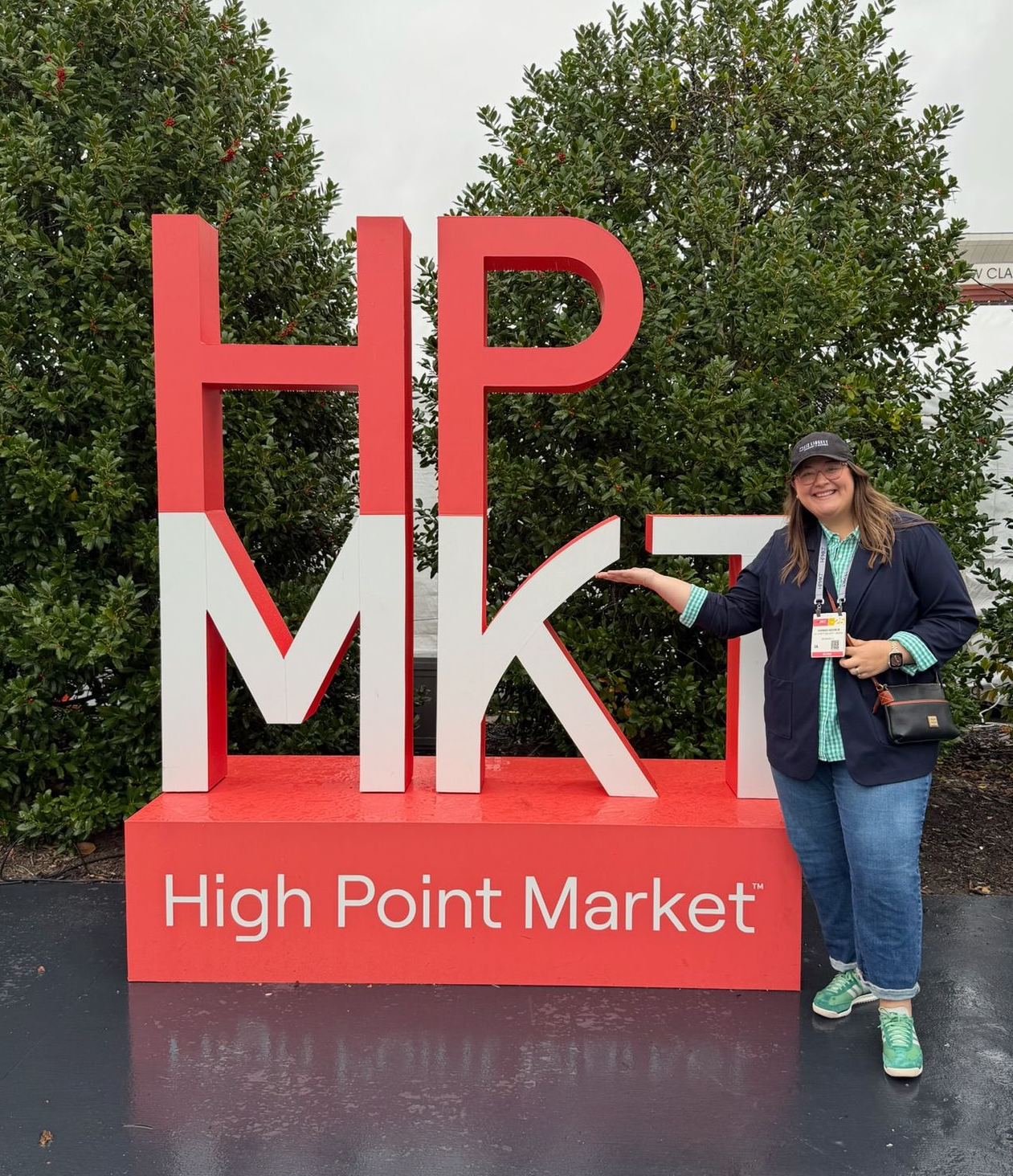Hannah with High Point Market sign
