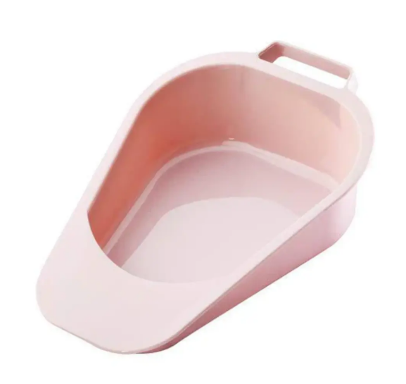 Pink plastic pet litter scoop with a handle