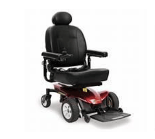 Red electric mobility scooter with black seat and armrests on a white background