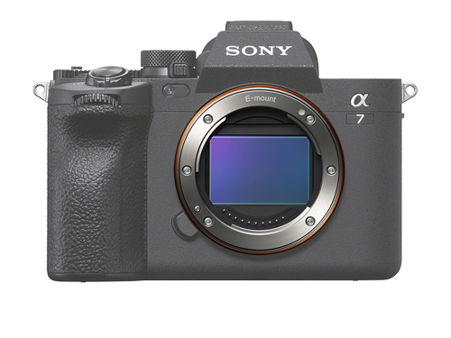 A sony camera is sitting on a white surface.
