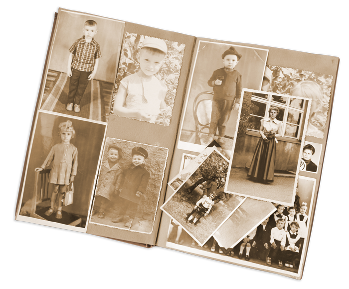 A book is open to a collage of old photographs of children