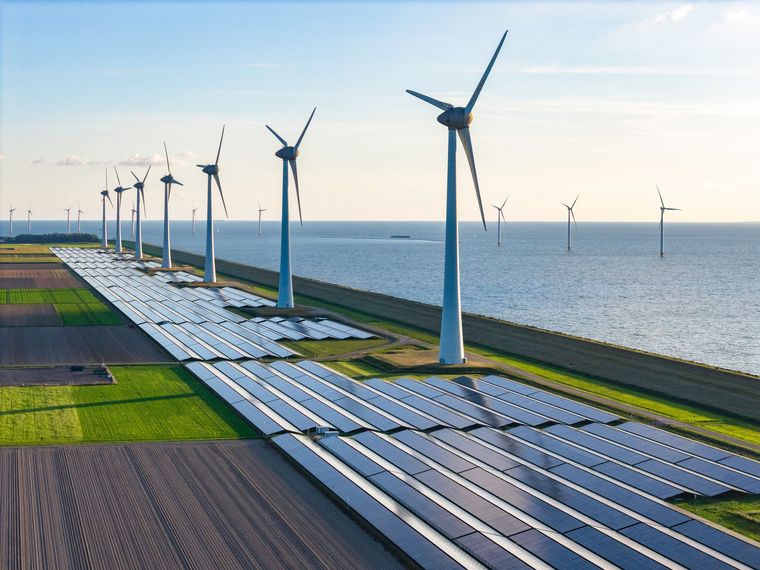 Solar panels and wind turbines on a coastal landscape, blue sky, generating renewable energy. Solar panels and wind turbines on a coastal landscape, blue sky, generating renewable energy.