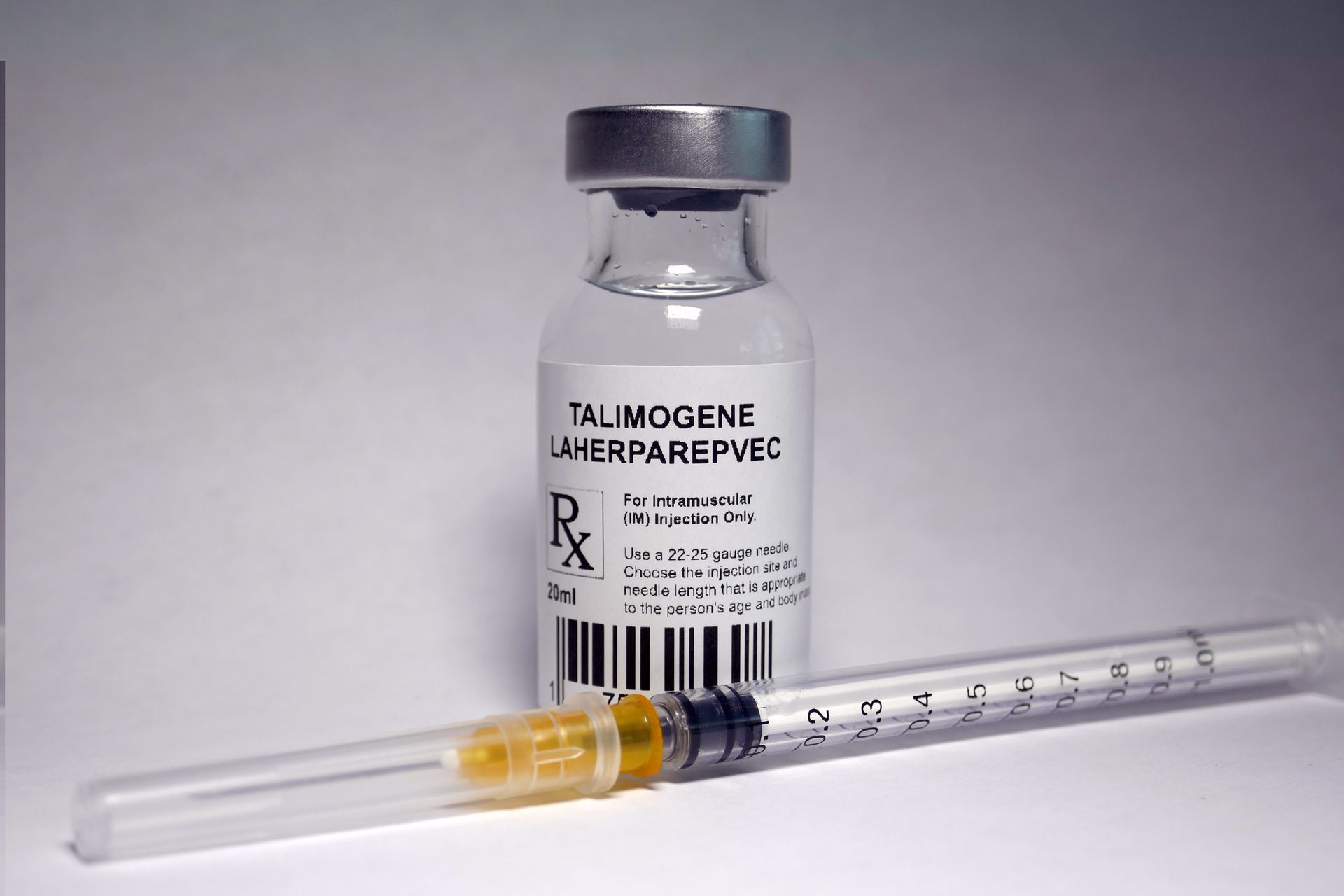 Vial of T-VEC and needle.