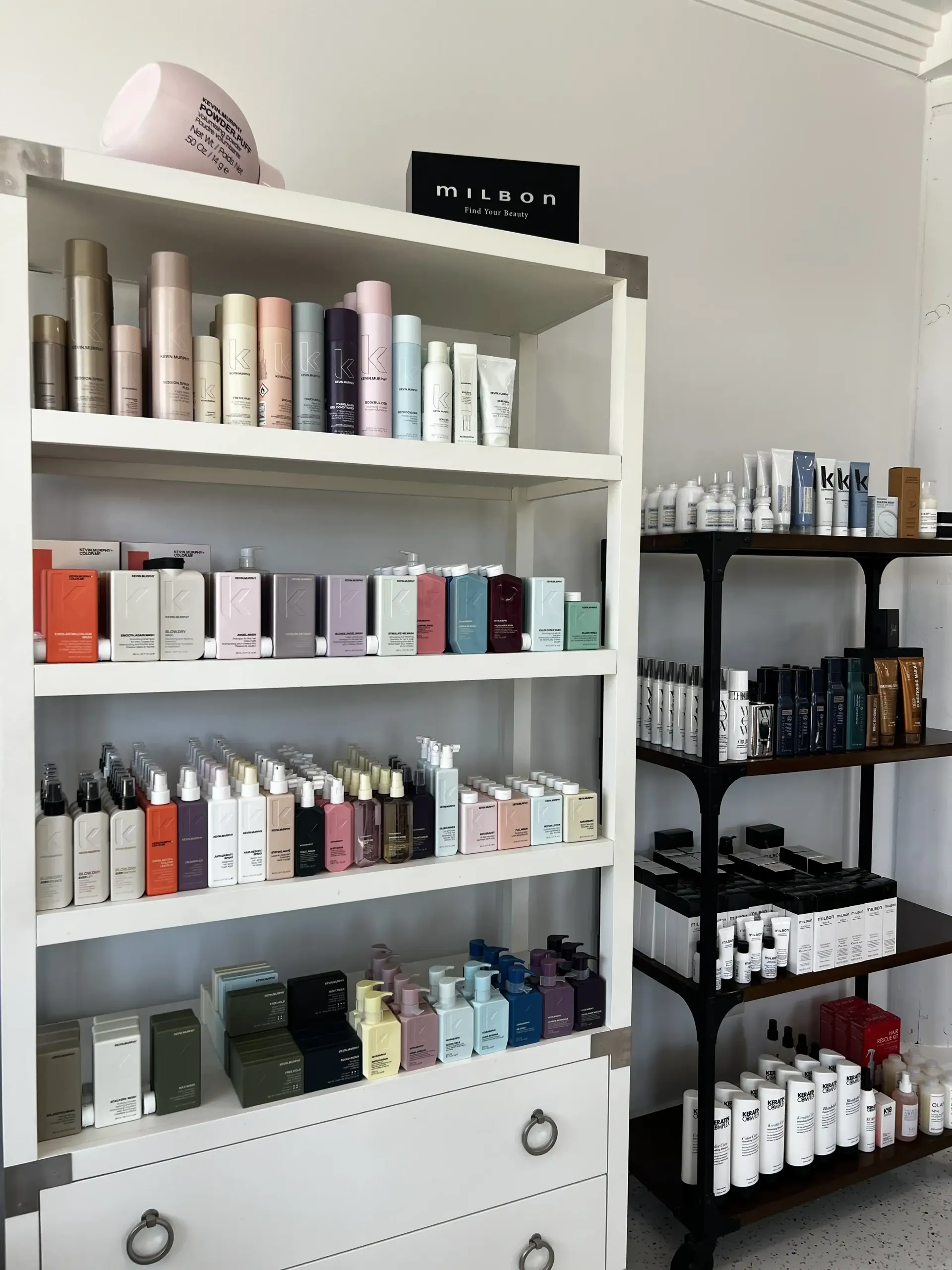 A shelf filled with lots of different types of cosmetics