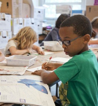 A boy is writing