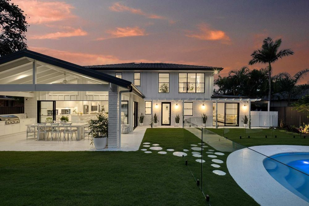 Large White House With a Swimming Pool in the Backyard — Beith Building & Developments Pty Ltd In Burleigh Heads, QLD