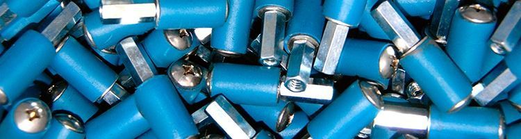 Blue aerosol cans scattered in a pile