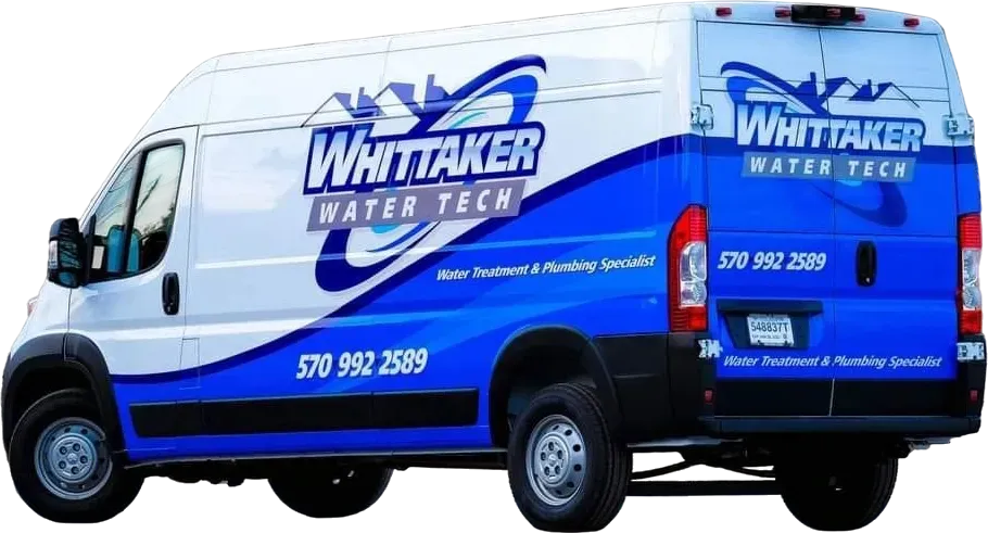 A blue and white van with the words whittaker water tech on it.