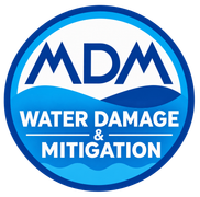MDM Water Damage & Mitigation blue circular logo with white text