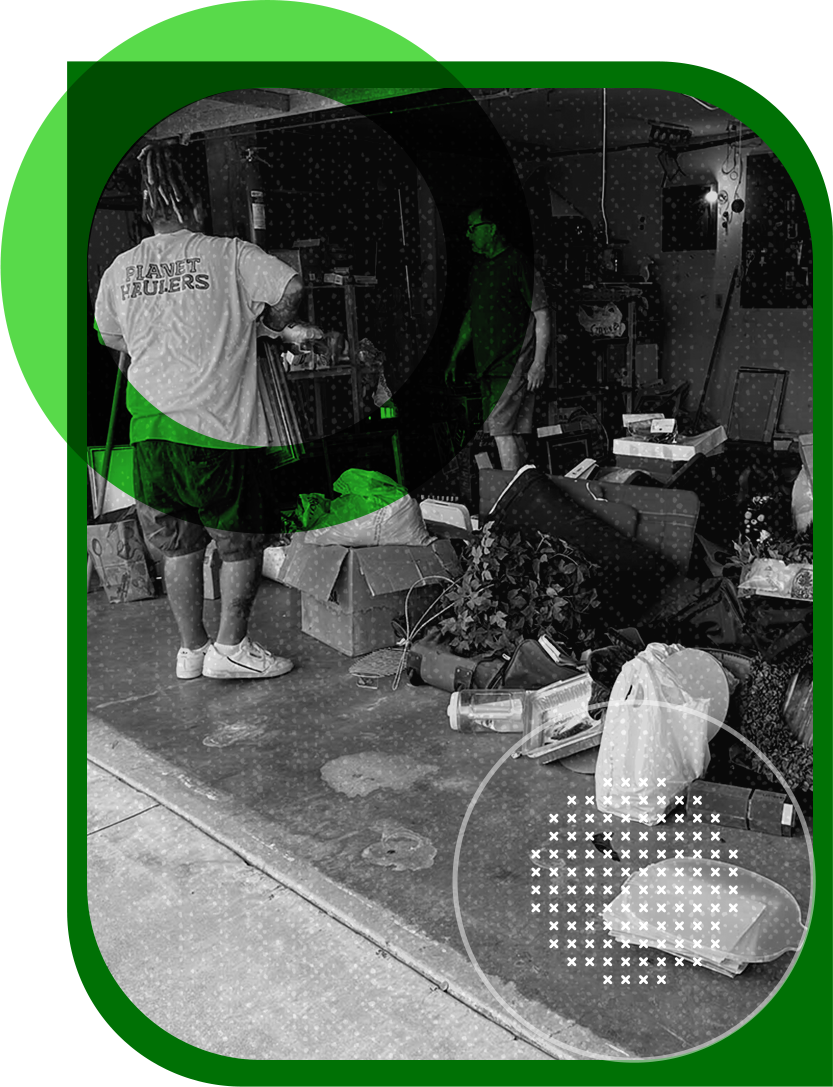 A man in a white shirt is standing in a messy room.