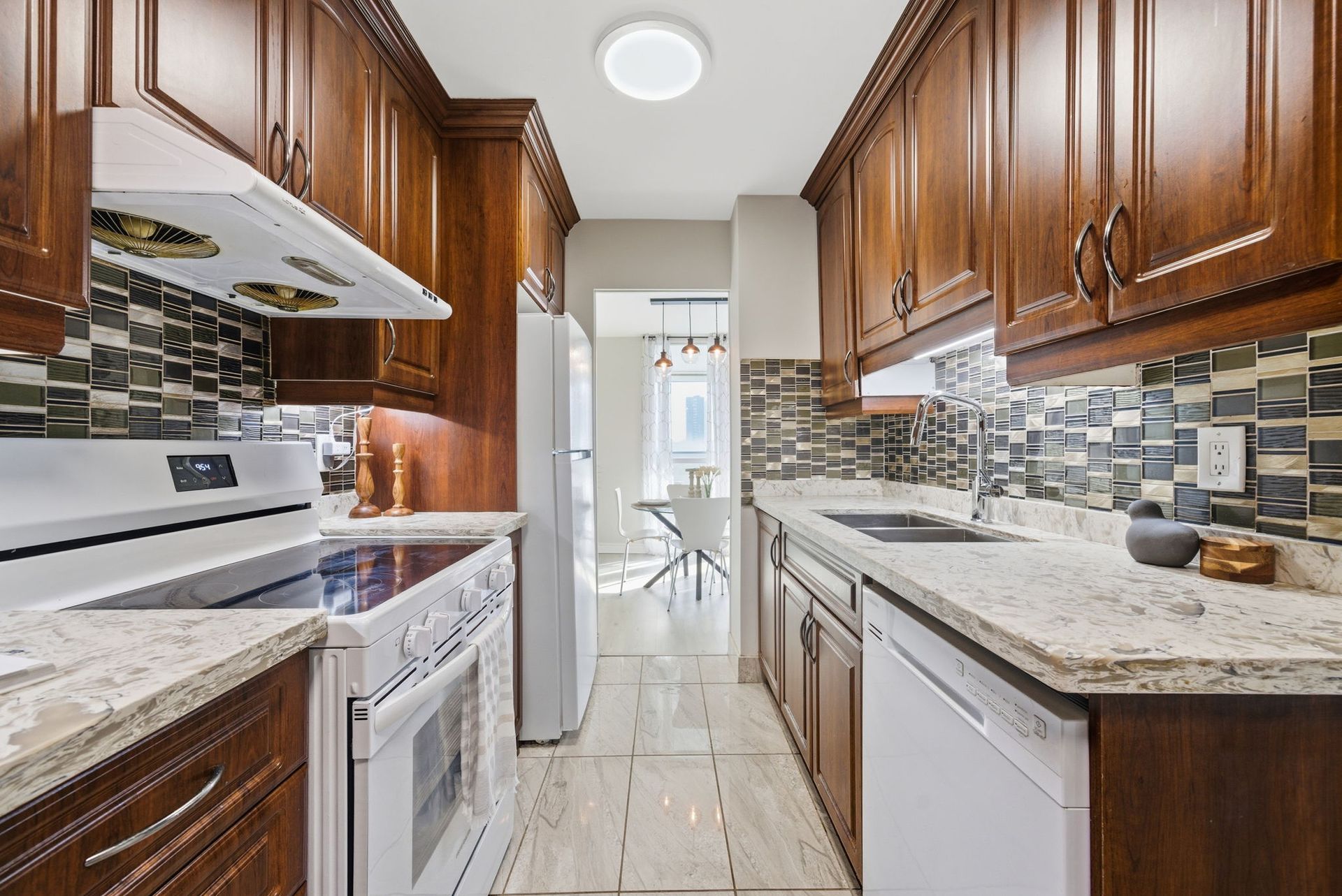 Kitchen detail showing backsplash and finishes, Laura Cooper Toronto real estate