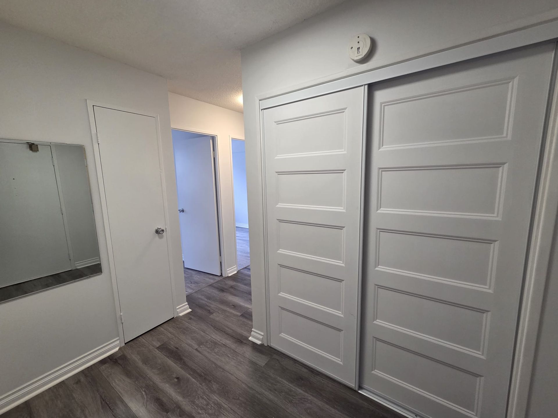 Primary bedroom with walk‑in closet and ensuite, listed by Laura Cooper Realtor