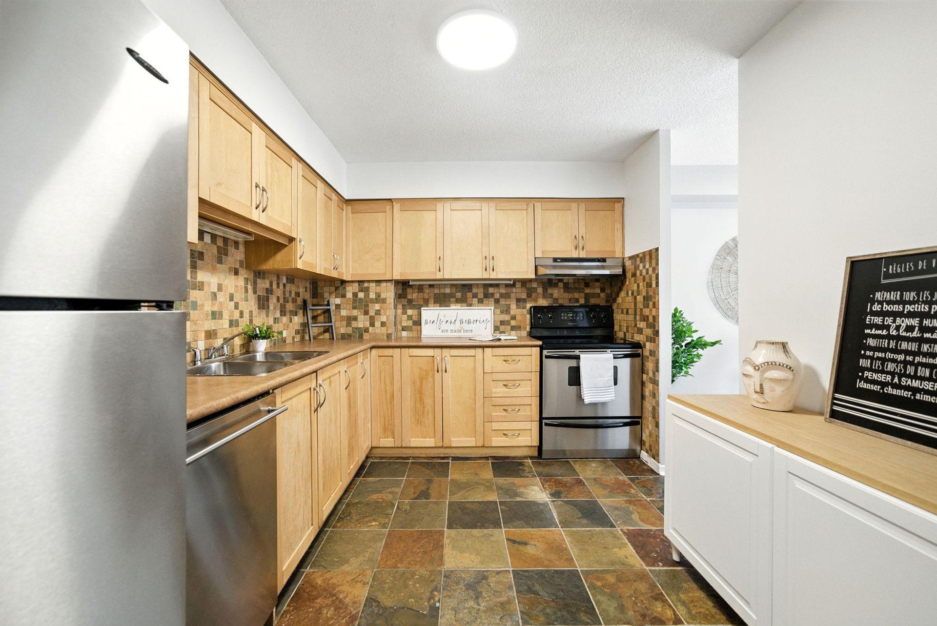 Kitchen, counters, stainless appliances, Laura Cooper Realtor