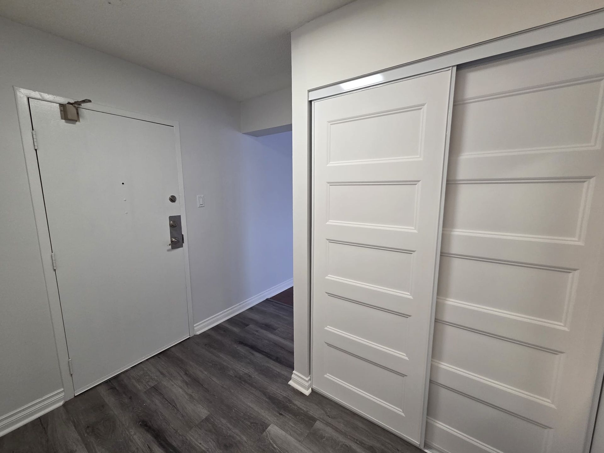 Primary bedroom with walk‑in closet and ensuite, listed by Laura Cooper Realtor