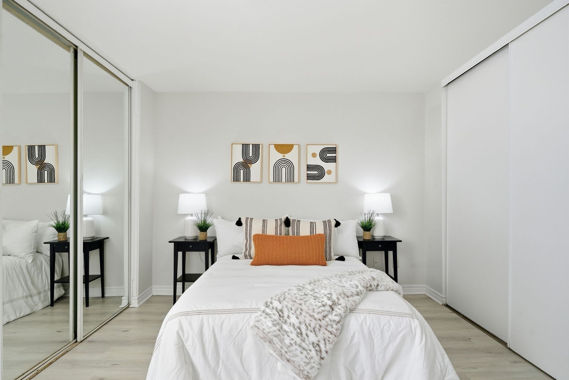 Primary bedroom with large window, Laura Cooper Realtor Toronto condo listing