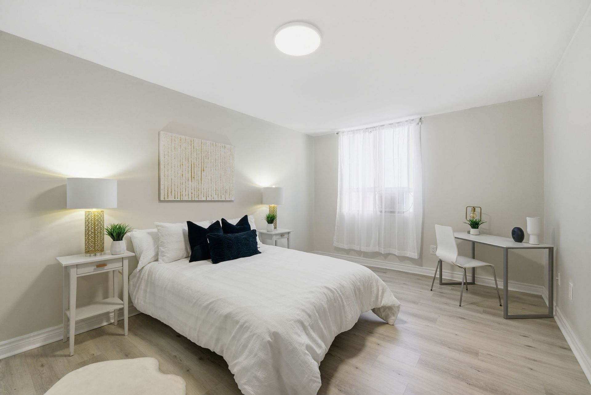 Primary bedroom with corner exposure and natural light, listed by Laura Cooper Realtor