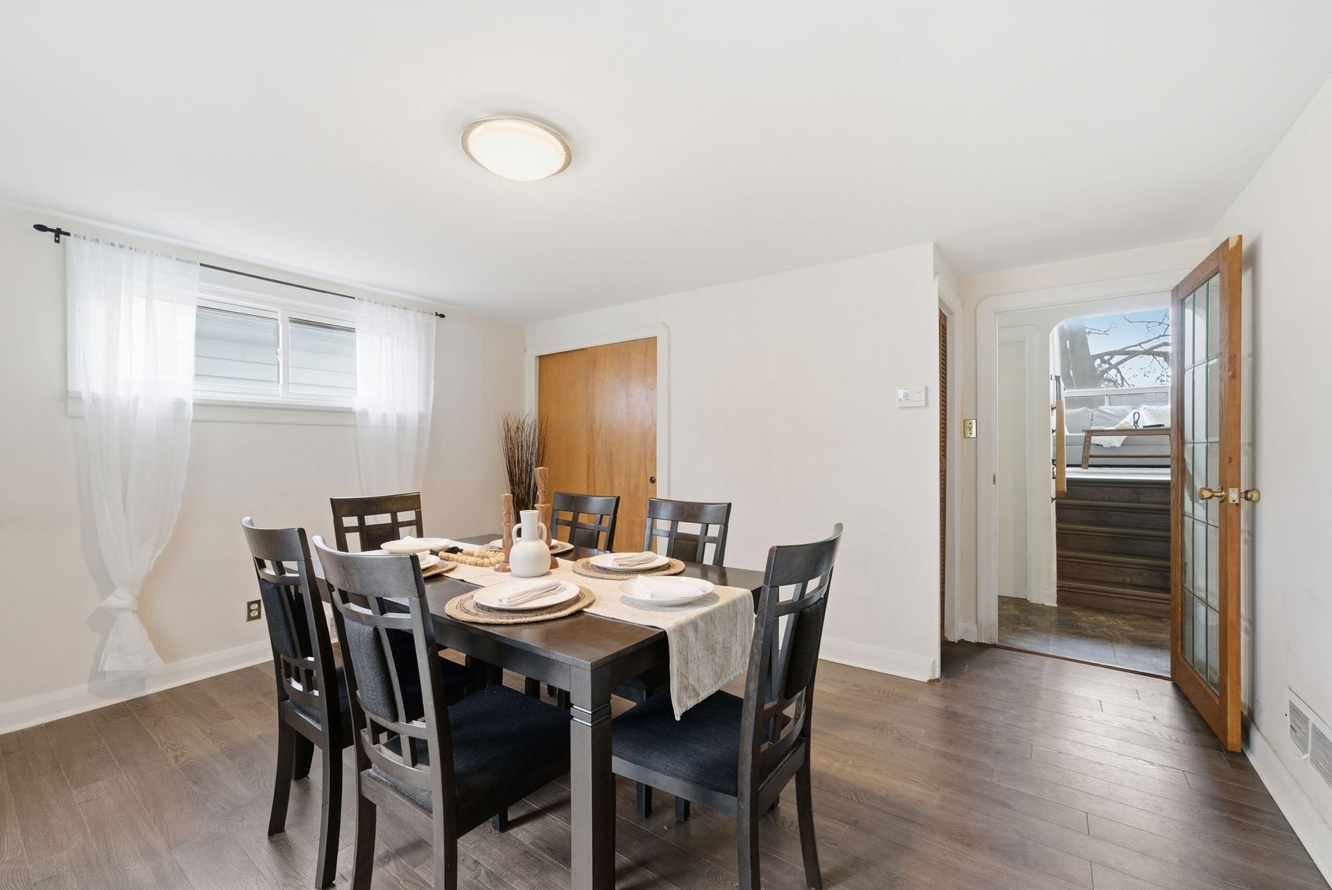 Separate dining room with space for family gatherings, listed by Laura Cooper Realtor
