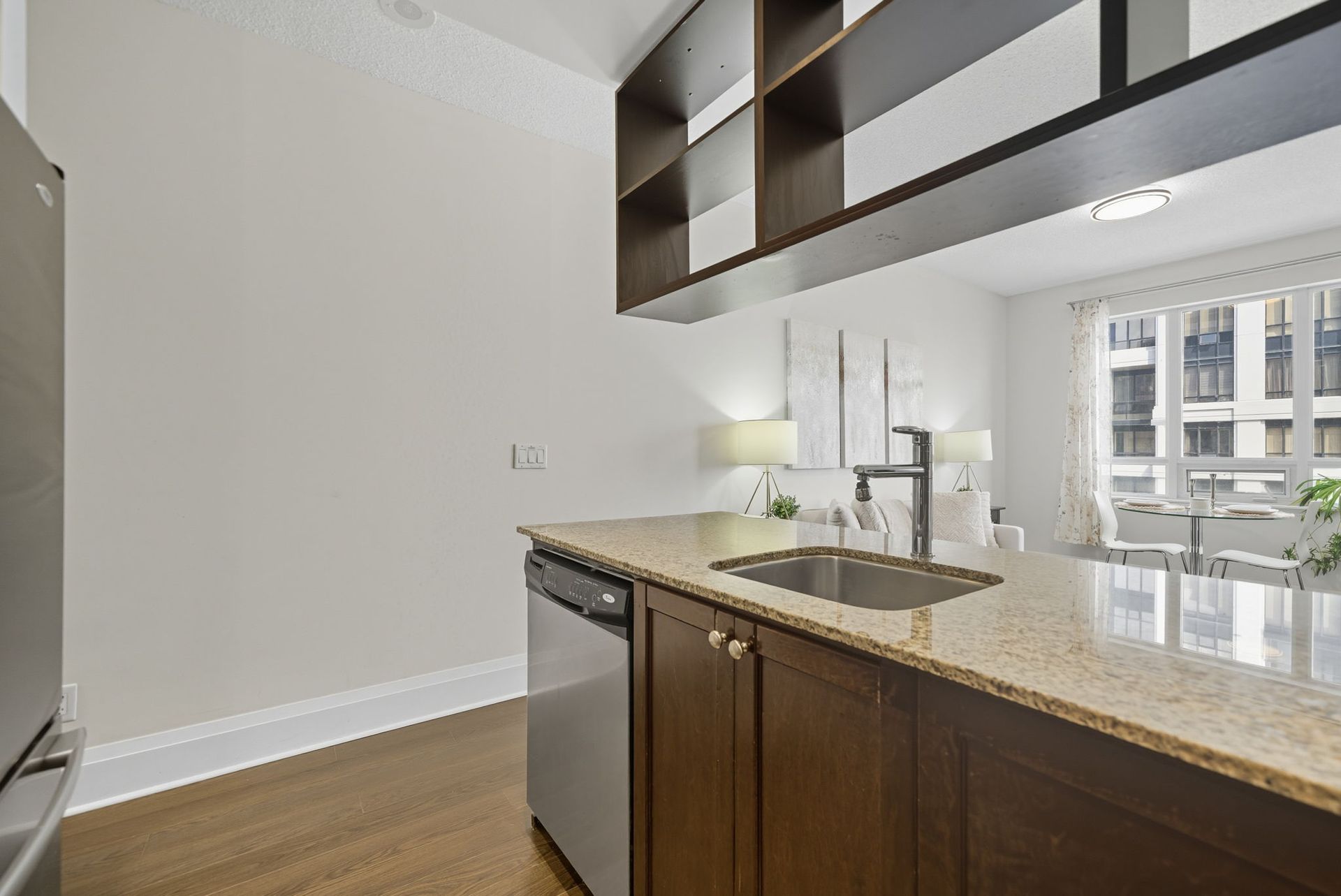 Modern kitchen with stainless steel appliances, 1808 condo by Laura Cooper Realtor