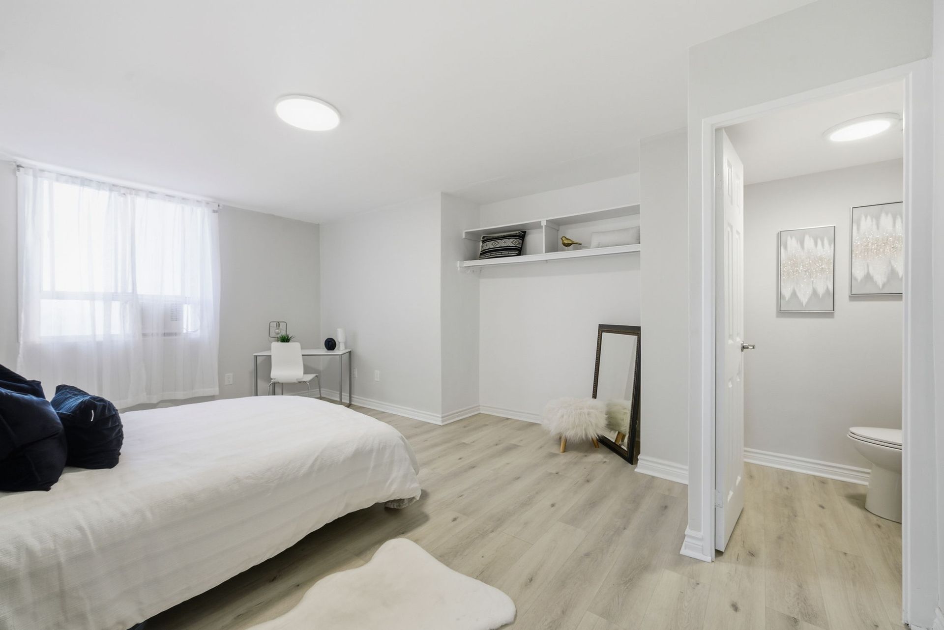 Bright second bedroom with neutral finishes, Laura Cooper Realtor Toronto