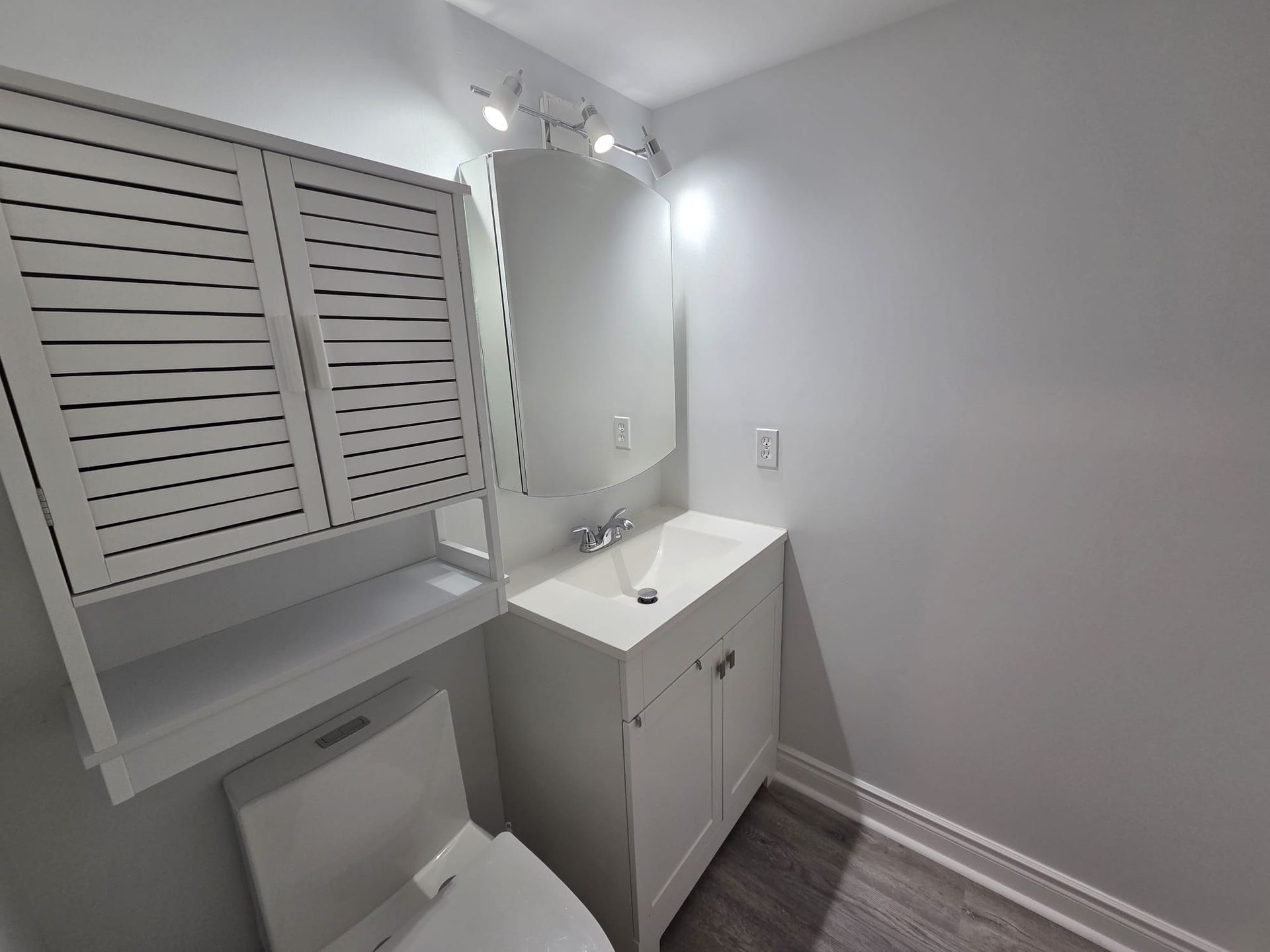 Bathroom vanity and mirror detail, 30 Sunrise Ave condo by Laura Cooper Realtor