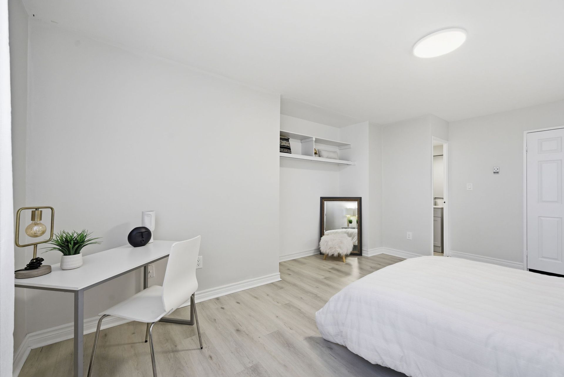 Bright second bedroom with neutral finishes, Laura Cooper Realtor Toronto