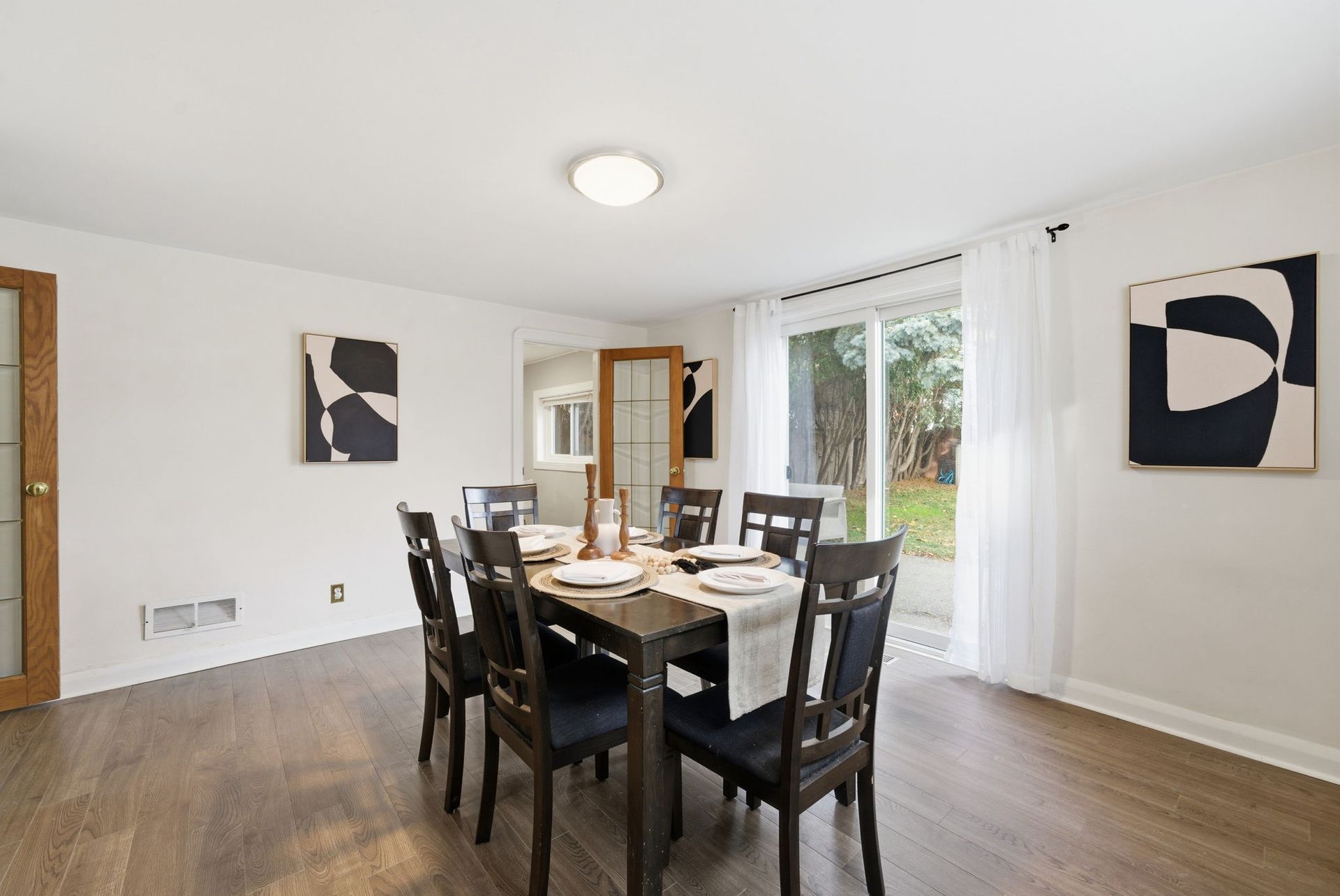 Walk‑out from dining room to fully fenced backyard, Oshawa real estate by Laura Cooper Realtor