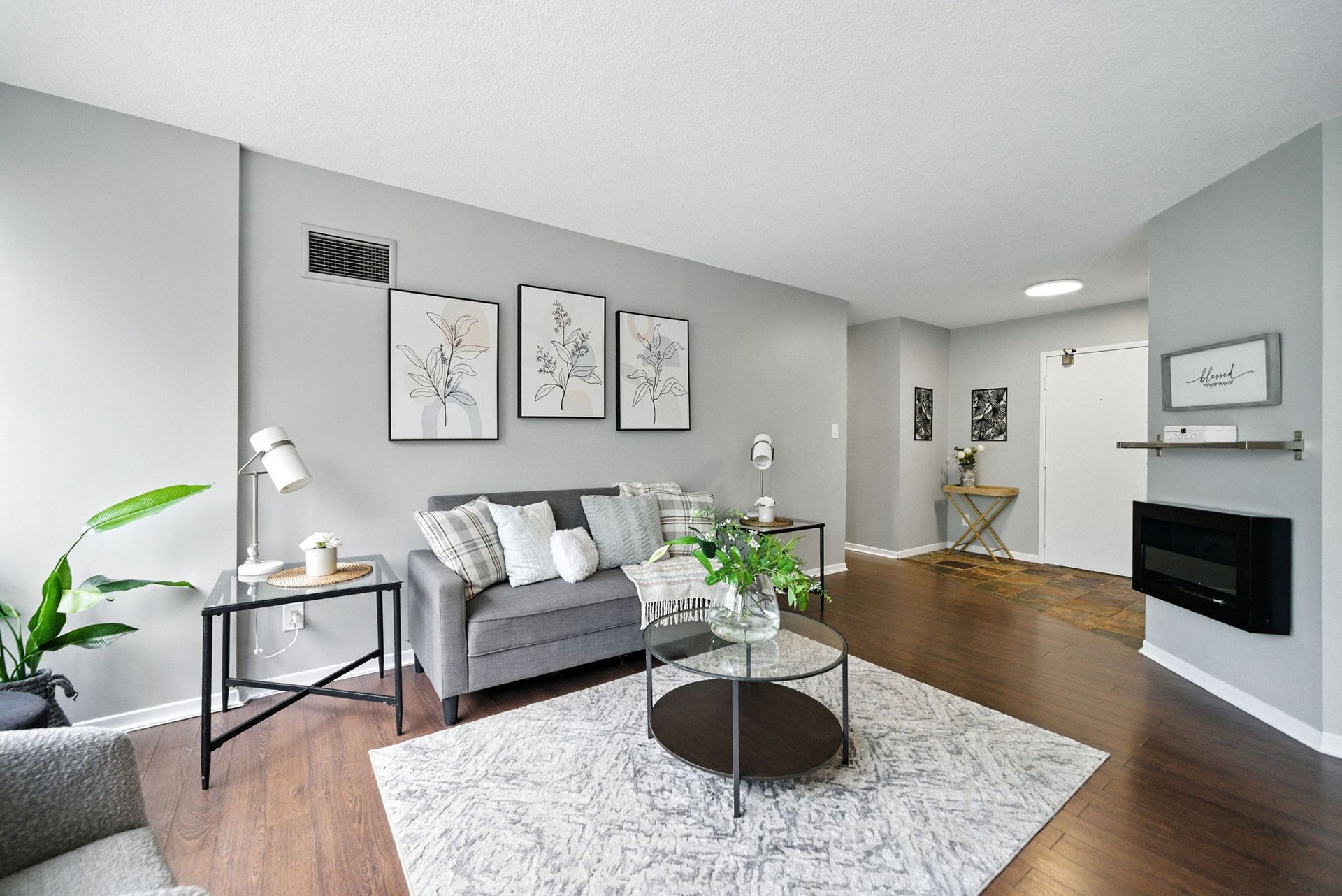 Open‑concept living and dining room with natural light, Laura Cooper Realtor Mississauga listing