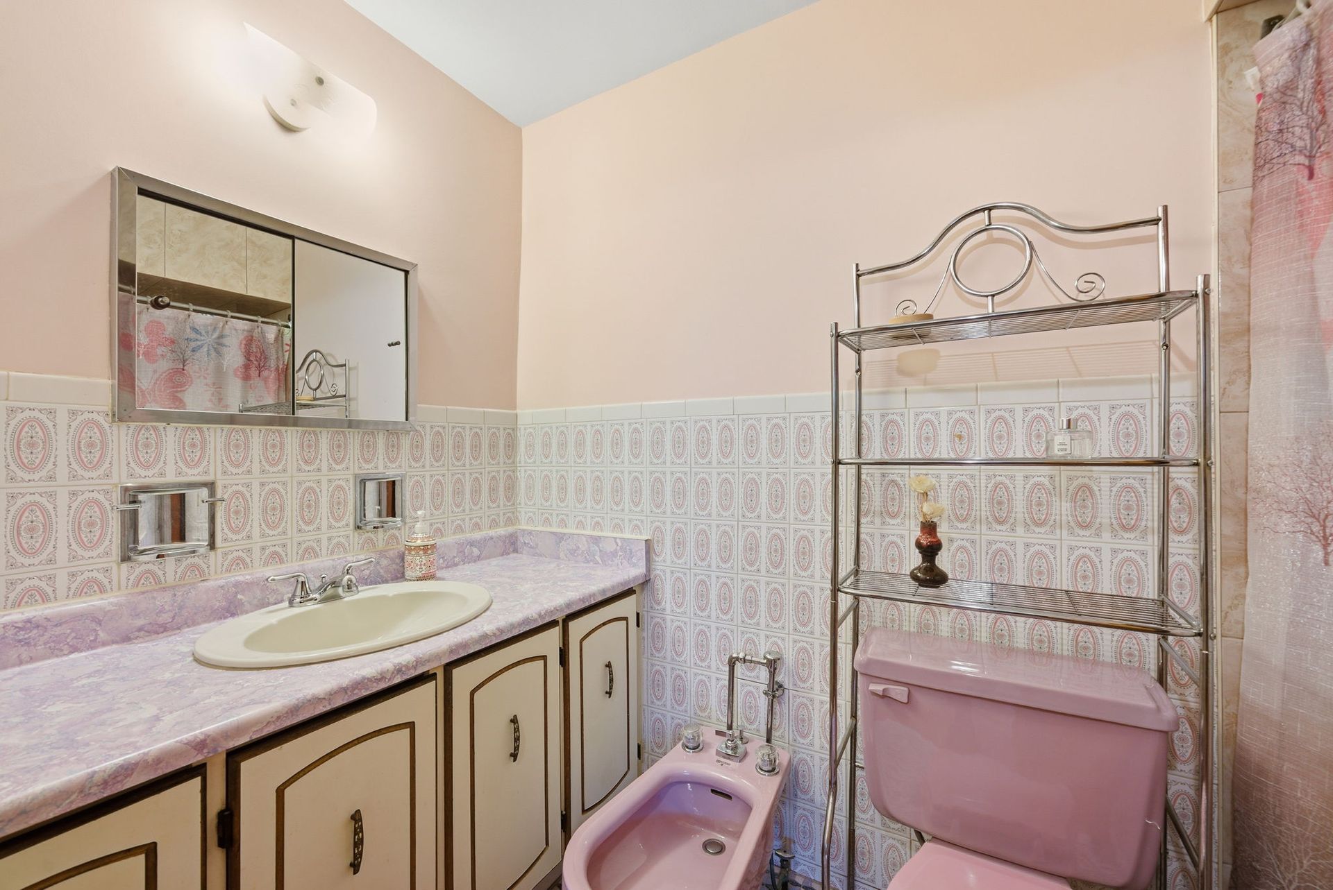 For Sale: bathroom detail with vanity and fixtures at 73A North Bonnington Ave, Laura Cooper Realtor
