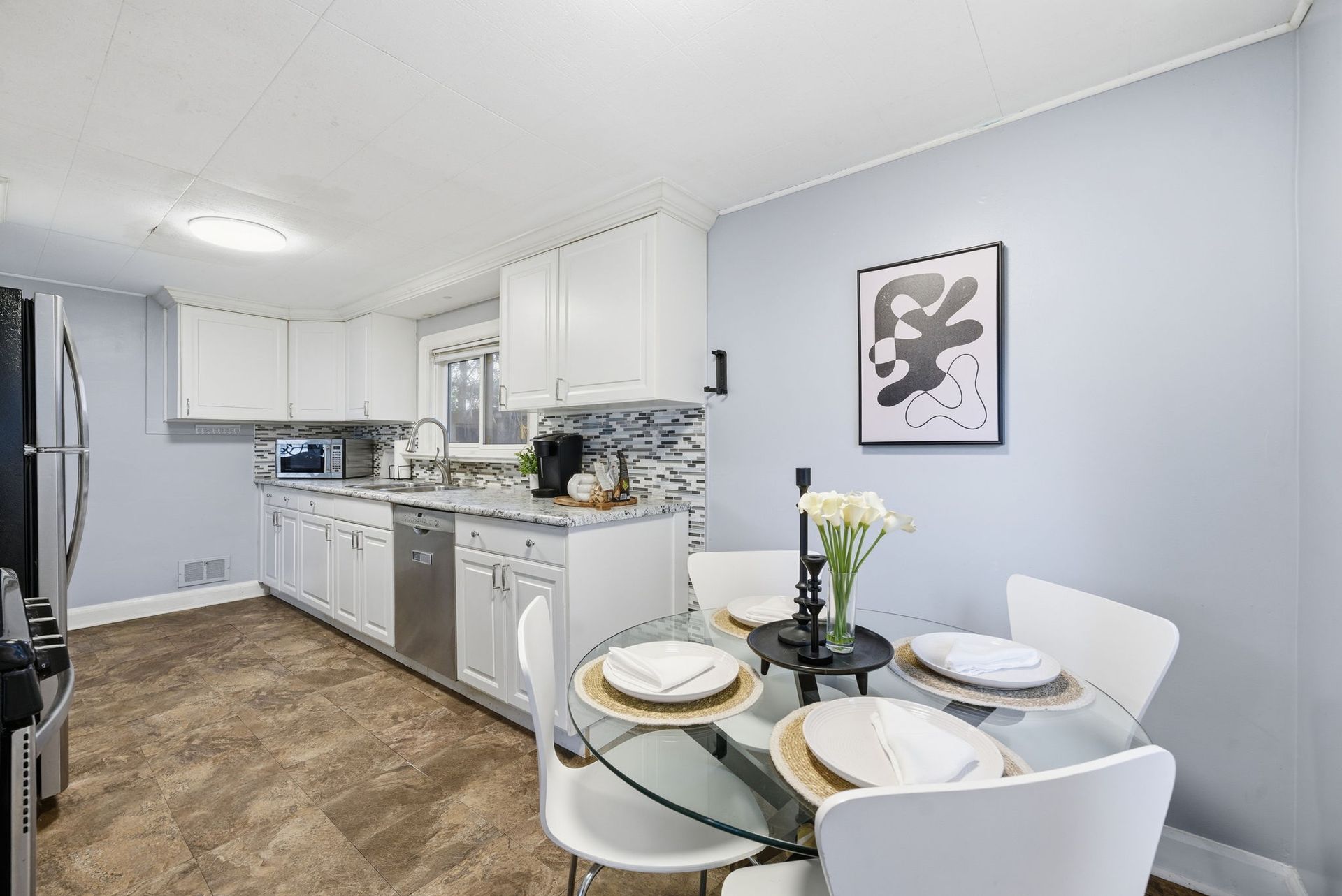 Kitchen detail with breakfast area and storage, Oshawa home by Laura Cooper Realtor