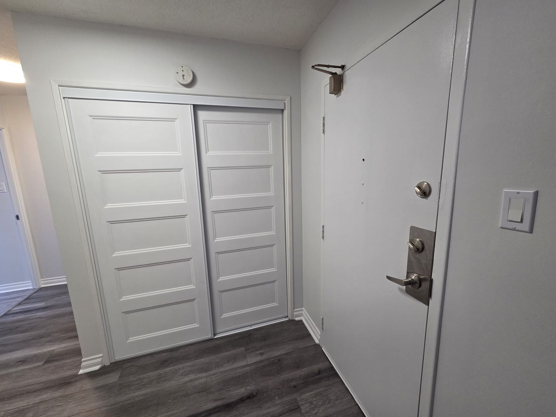 Interior hallway space showing laminate/vinyl floors, Laura Cooper Realtor 