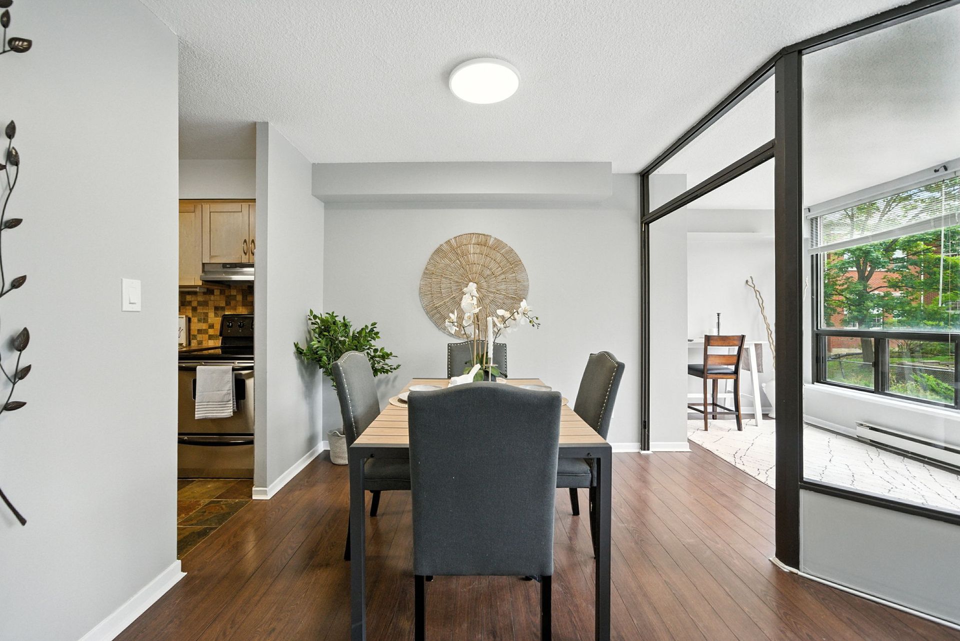 Dining area adjacent to living space with open layout, listed by Laura Cooper Realtor