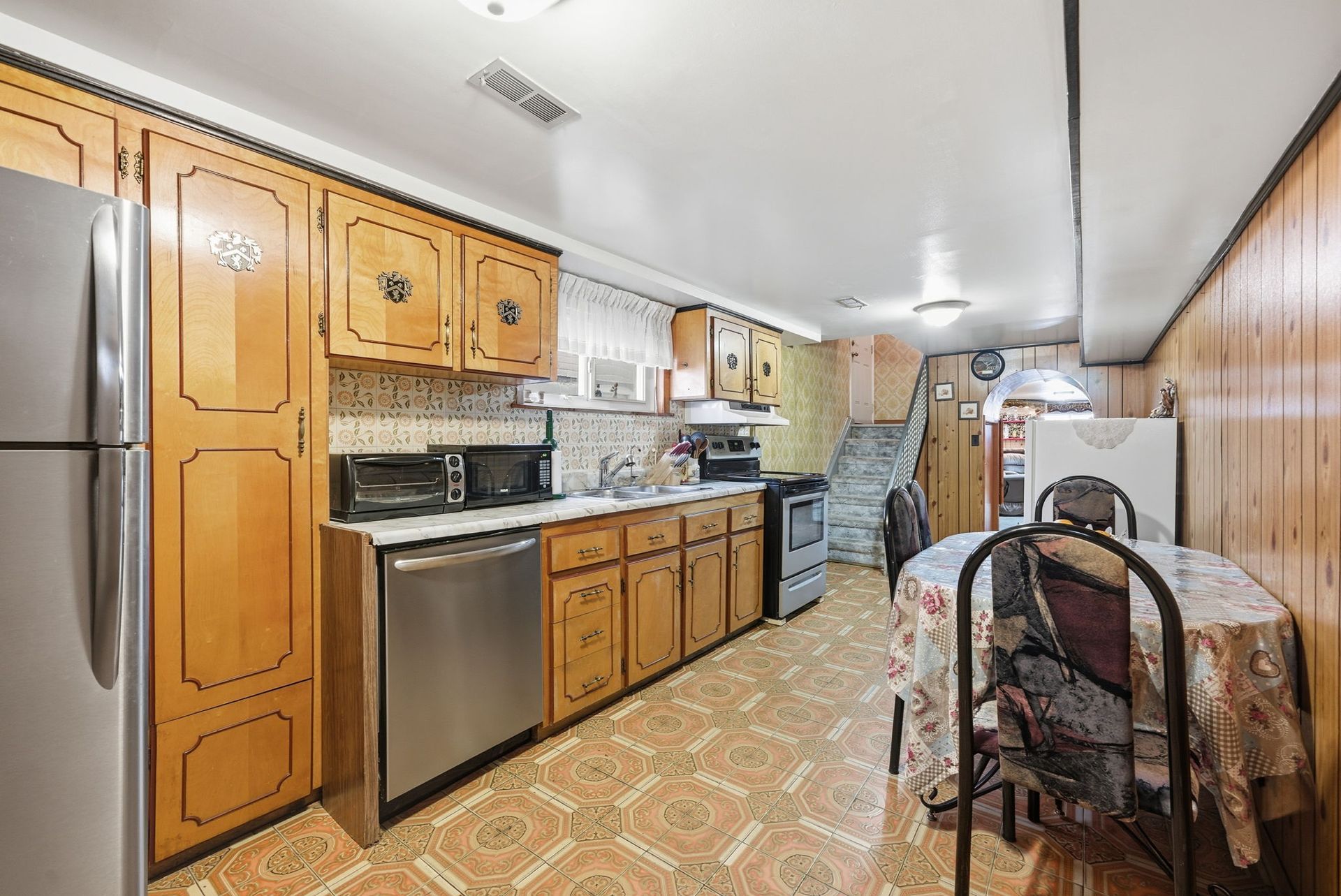 For Sale: second eat‑in kitchen in lower level at 73A North Bonnington Ave, listed by Laura Cooper Realtor