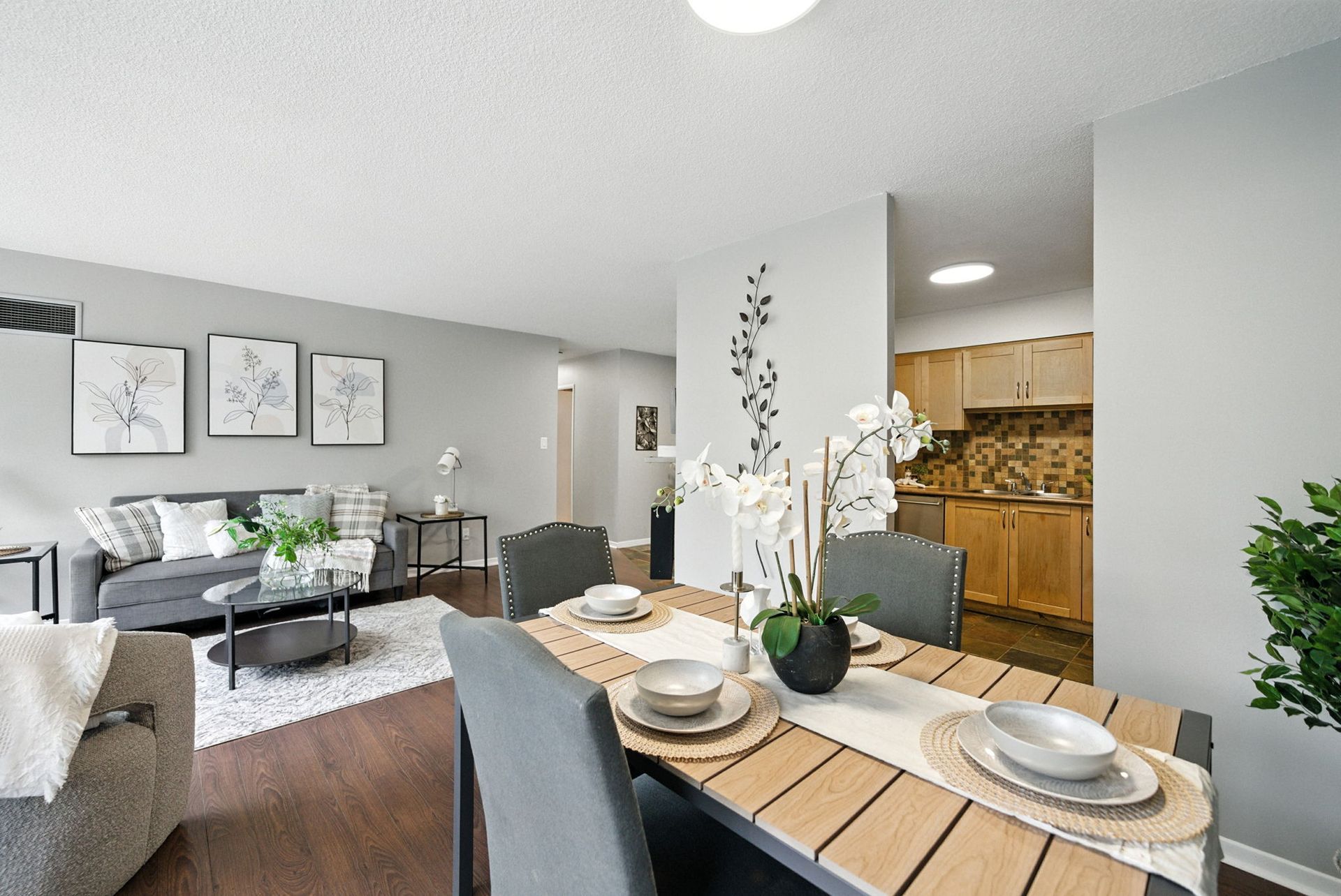 Open‑concept living and dining room with natural light, Laura Cooper Realtor Mississauga listing