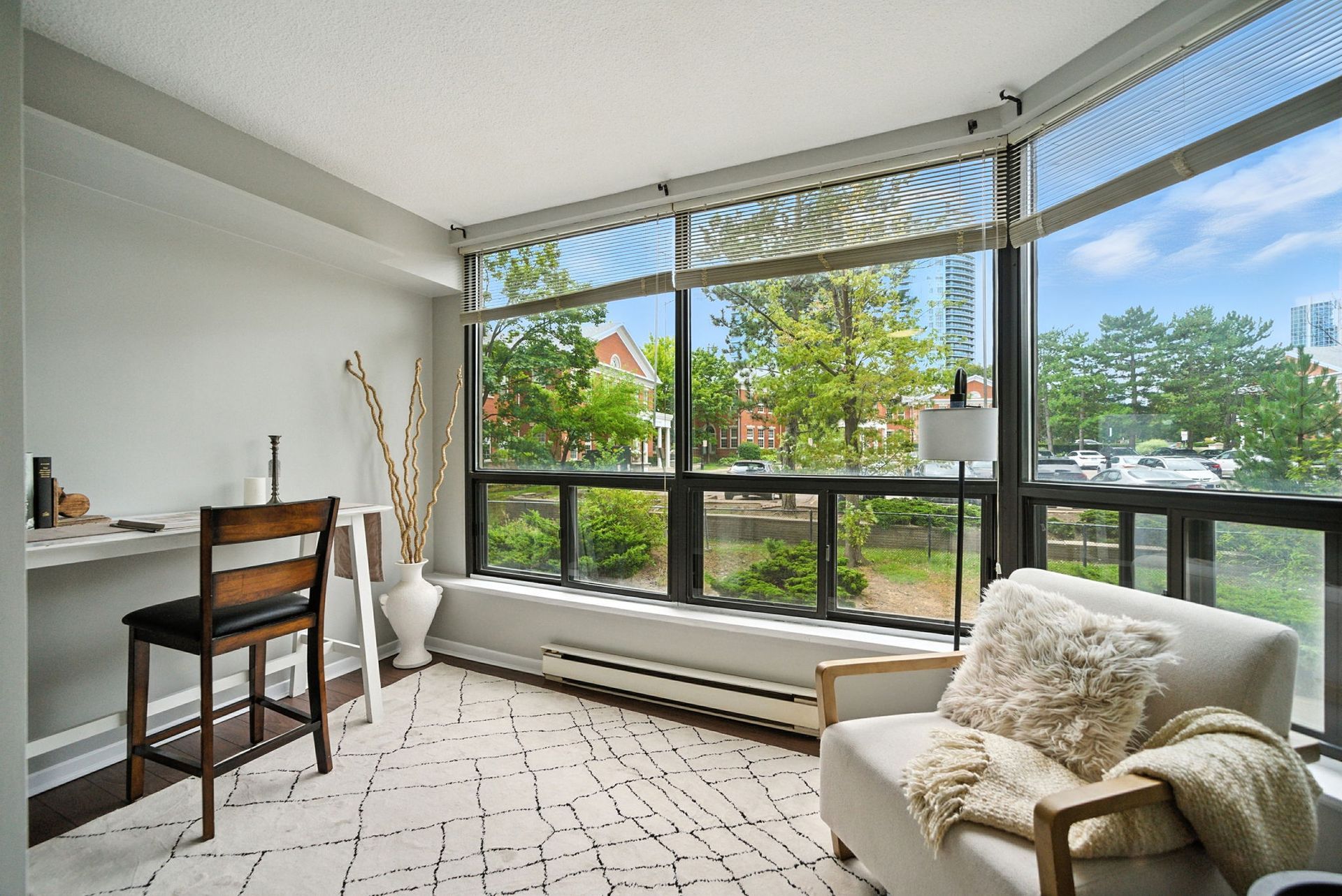 Solarium or den space with large windows, 201 unit by Laura Cooper Realtor
