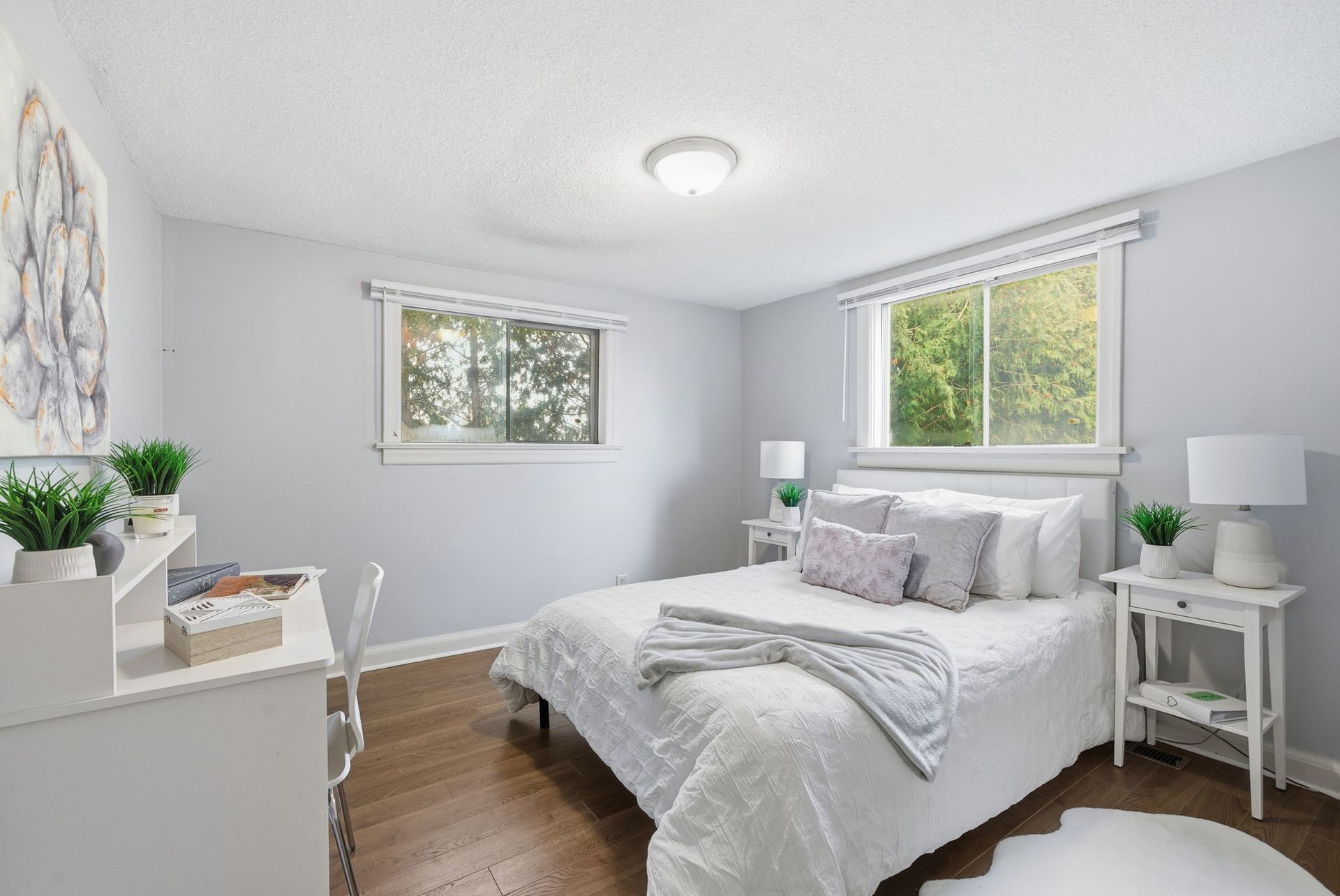 Second bedroom with large window and bright finishes, Oshawa property by Laura Cooper Realtor