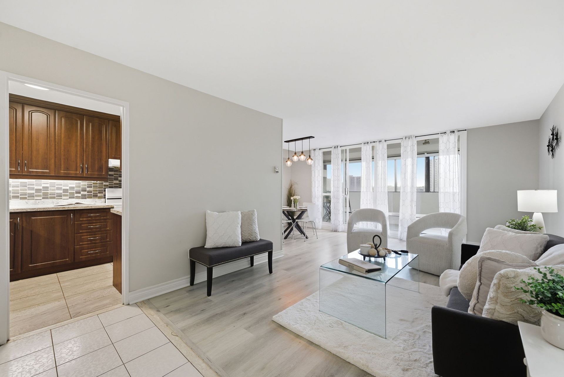 Open-concept living and dining room in Toronto condo by Laura Cooper Realtor