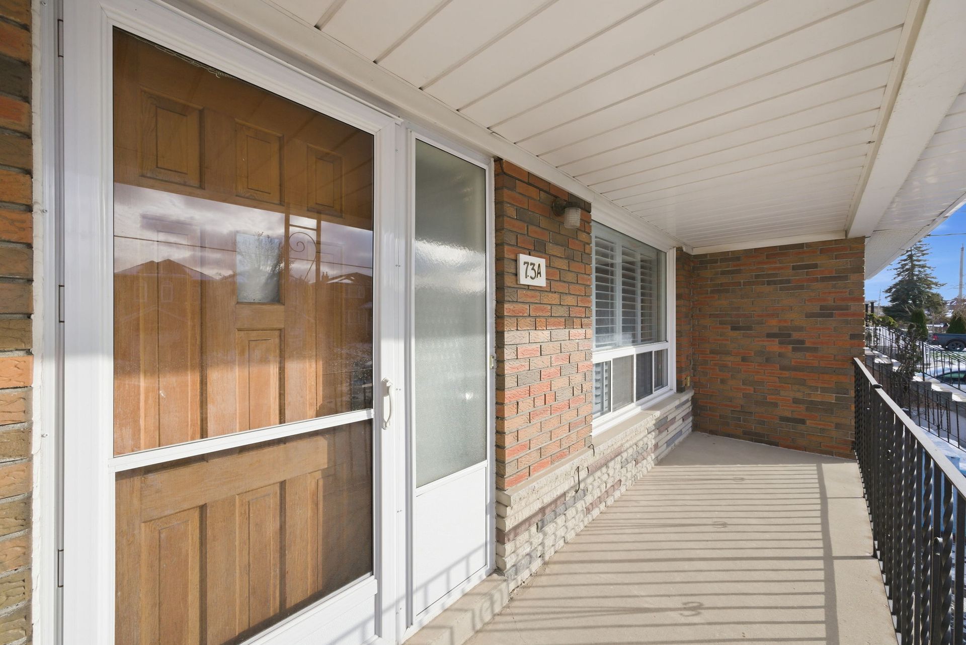 For Sale: covered front porch and entry at 73A North Bonnington Ave, Laura Cooper Realtor Toronto