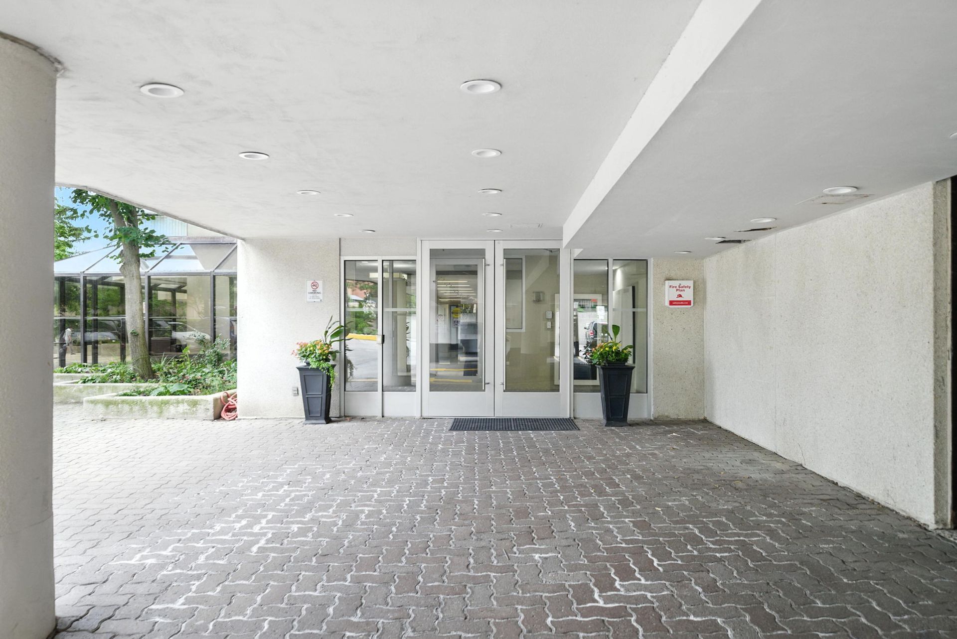 Front entrance and lobby access at Sherwood Towers, Mississauga real estate by Laura Cooper Realtor