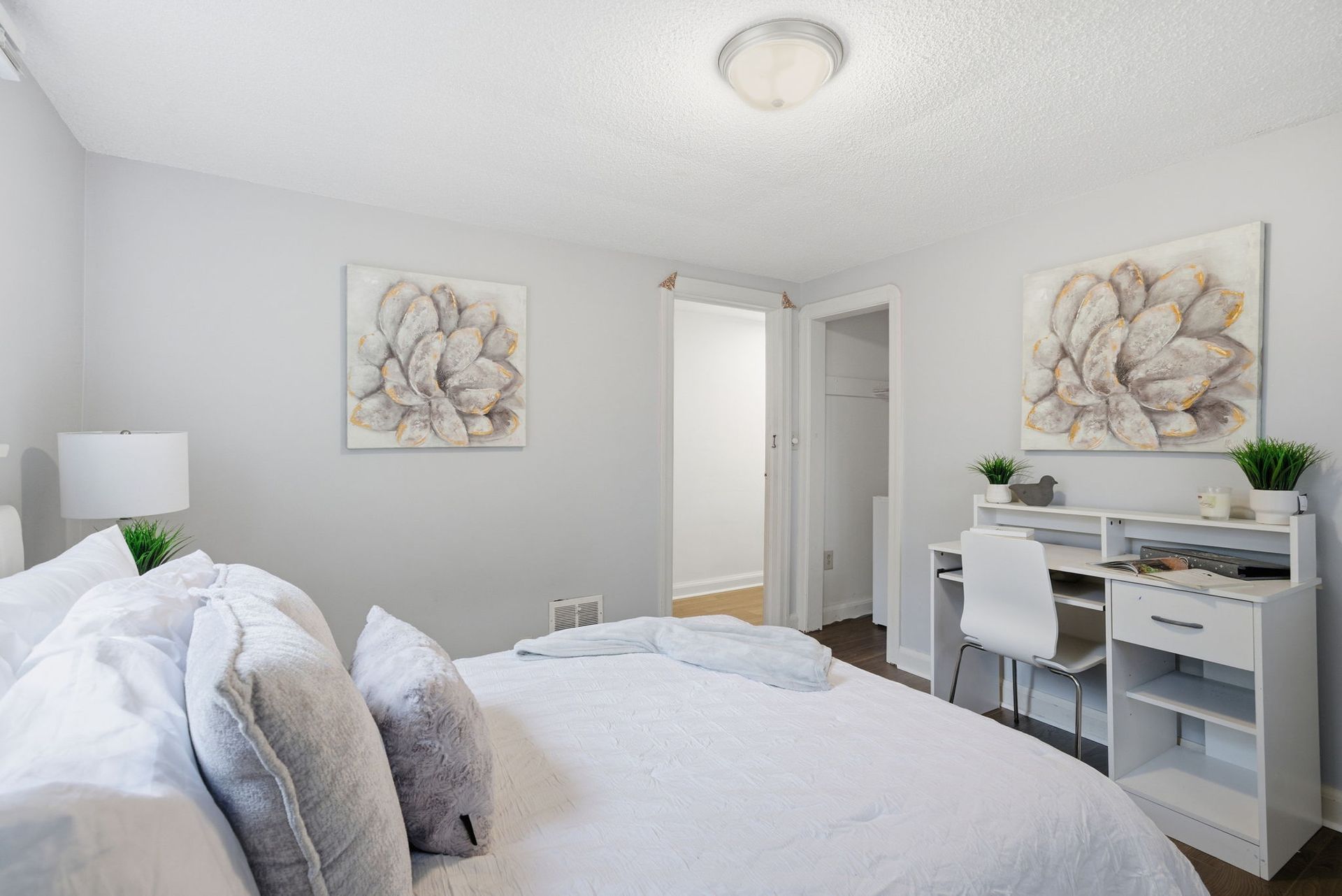 Second bedroom with large window and bright finishes, Oshawa property by Laura Cooper Realtor