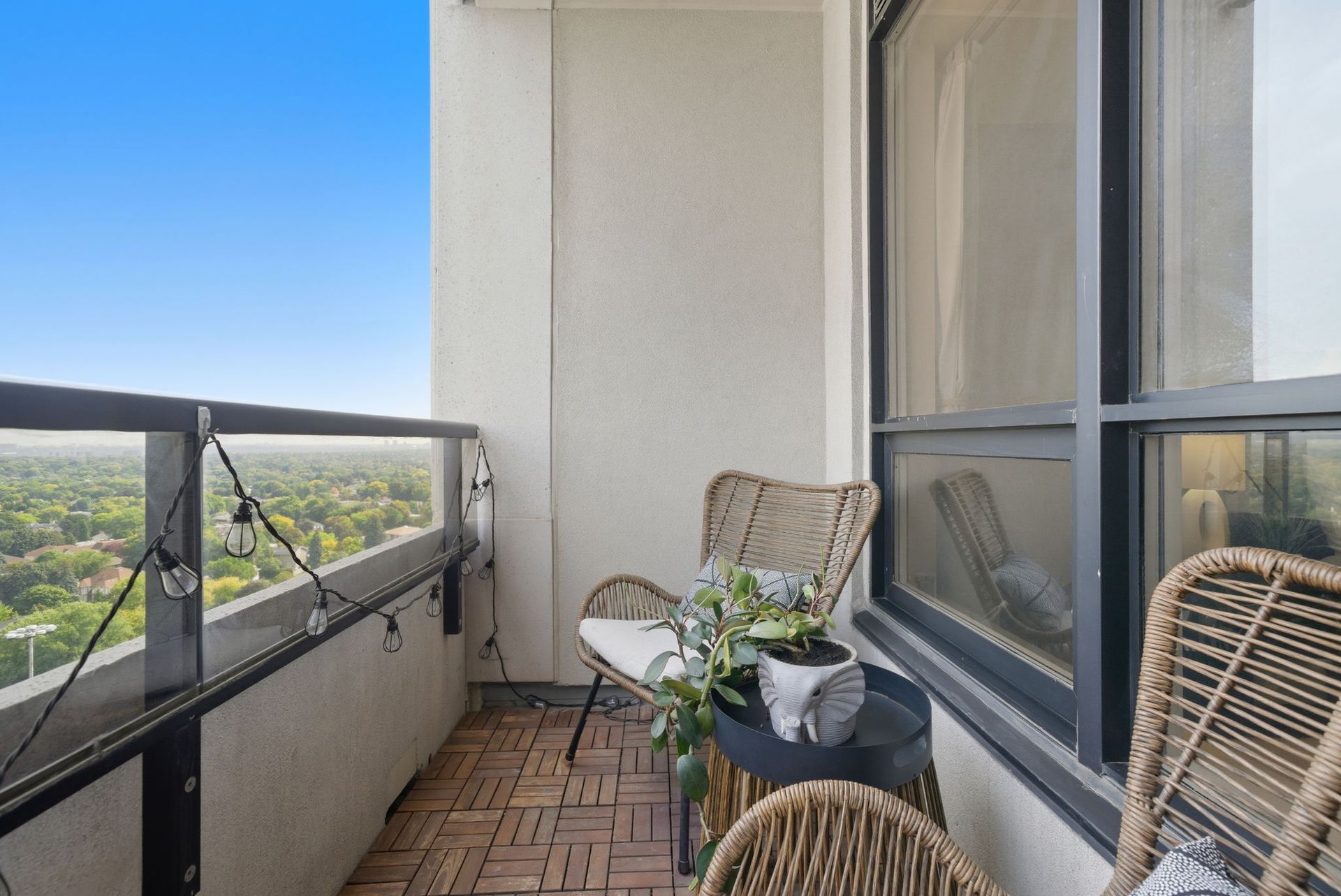 Balcony outdoor space with sweeping city skyline view, listed by Laura Cooper Realtor