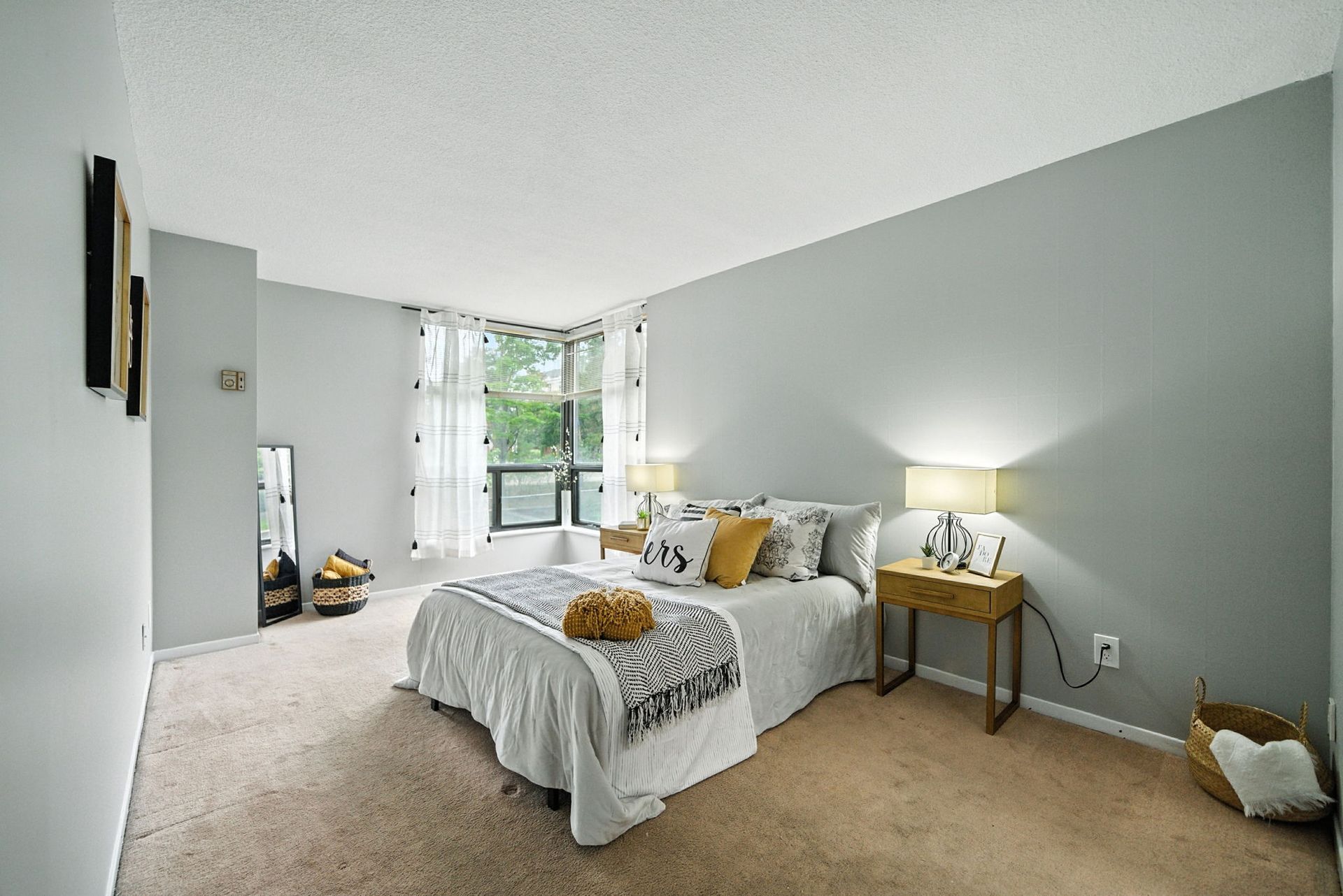 Second bedroom with closet and windows, listed by Laura Cooper Realtor