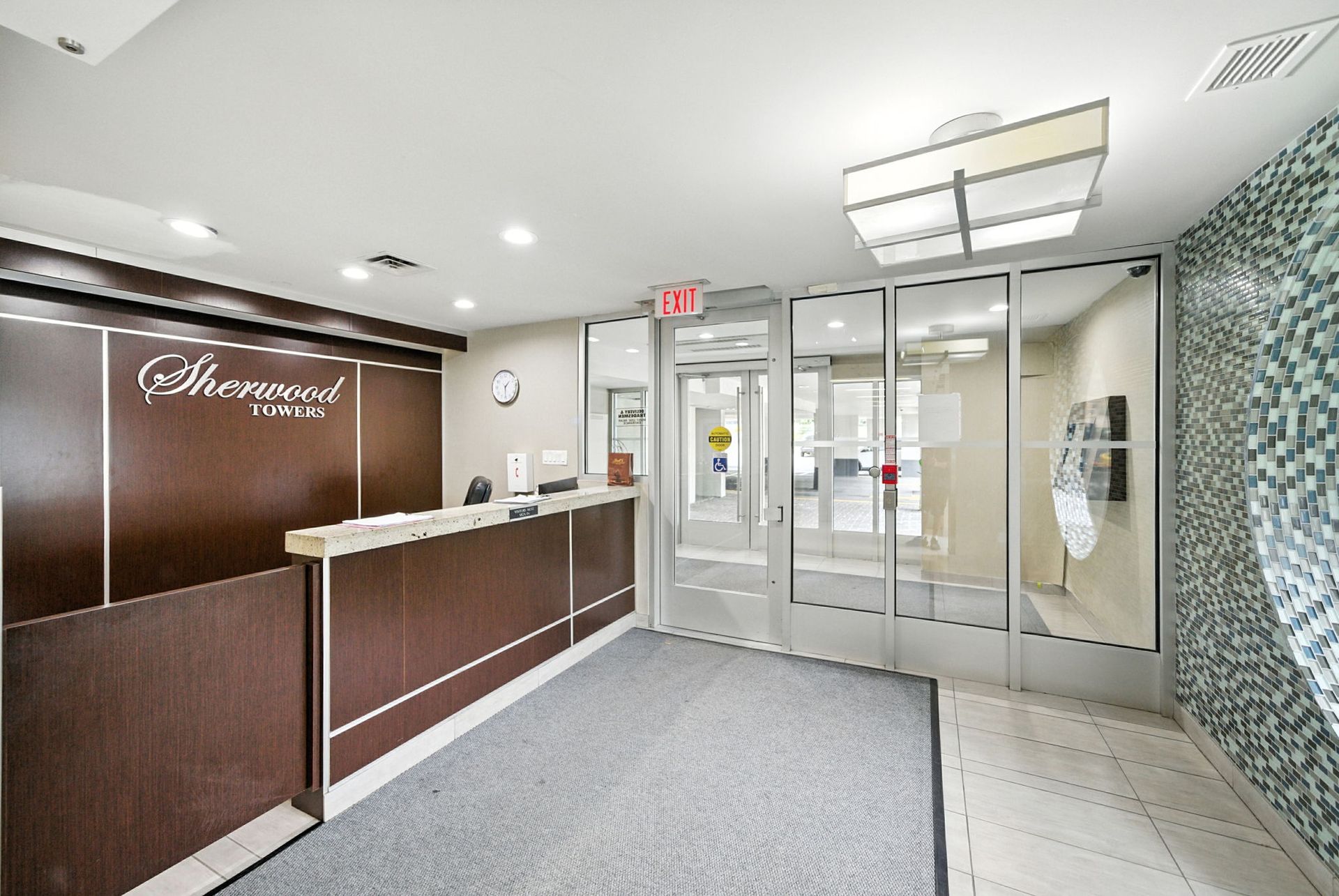 Front entrance and lobby access at Sherwood Towers, Mississauga real estate by Laura Cooper Realtor