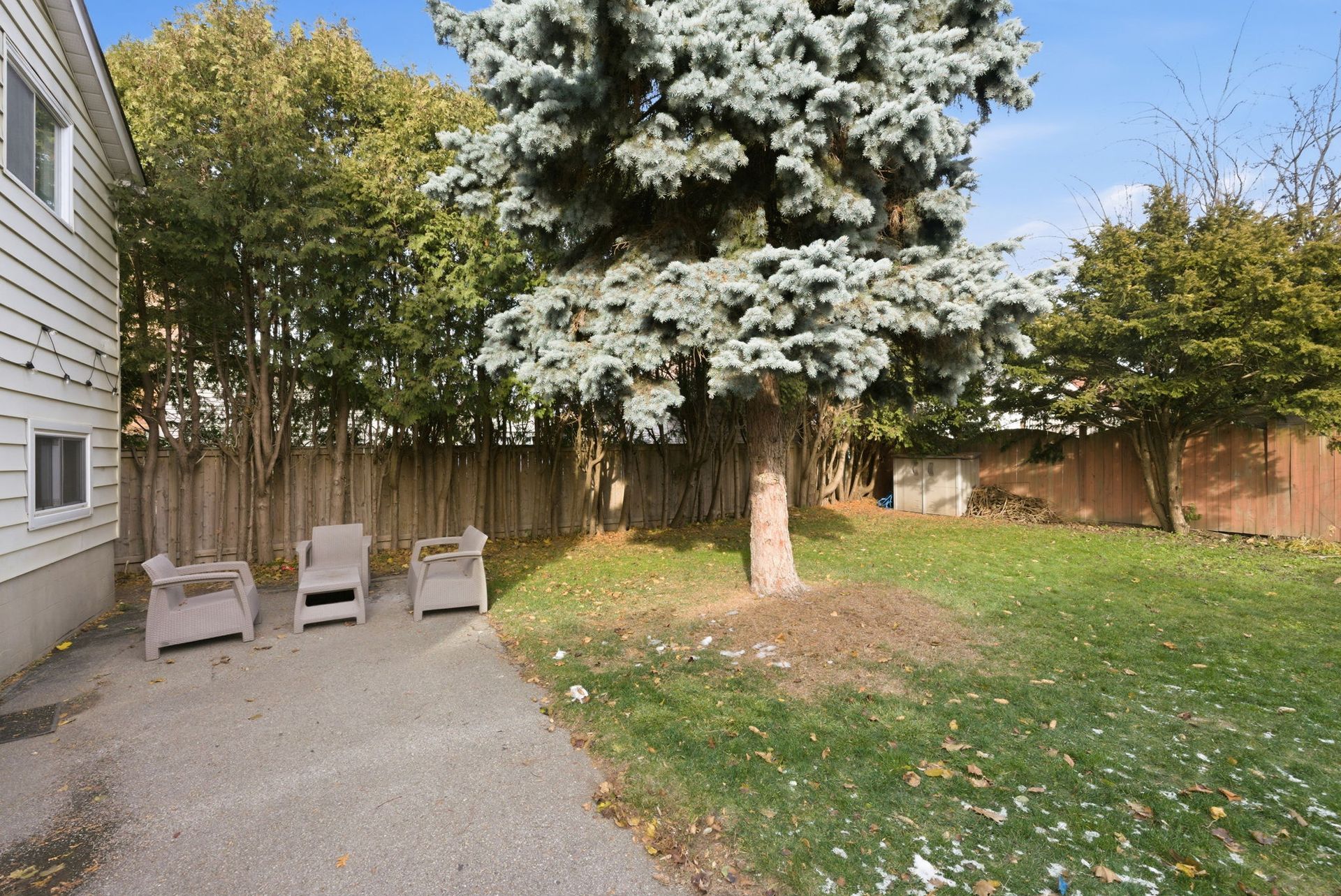 Backyard patio area ready for summer gatherings, Oshawa home by Laura  Cooper  Realtor