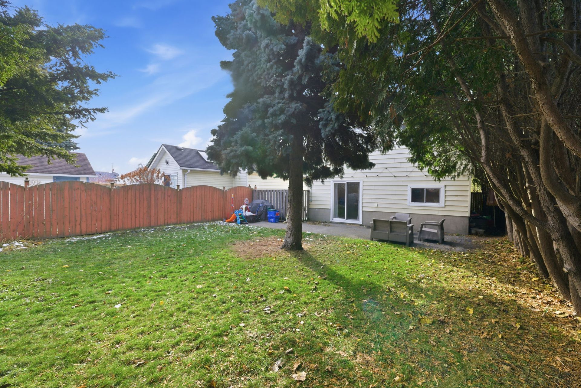 Landscape view of backyard fenced greenspace, listed by Laura  Cooper  Realtor