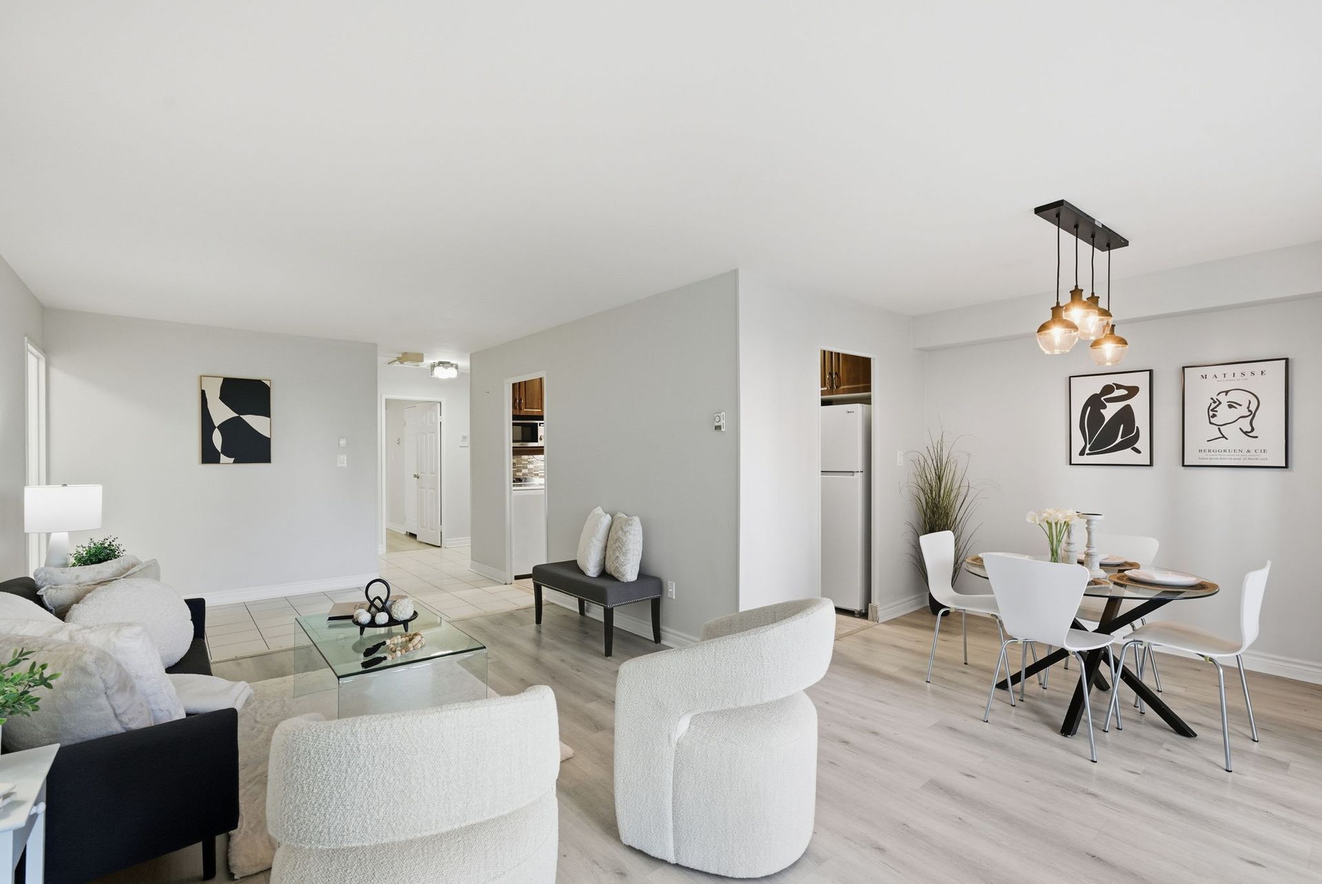 Open-concept living and dining room in Toronto condo by Laura Cooper Realtor