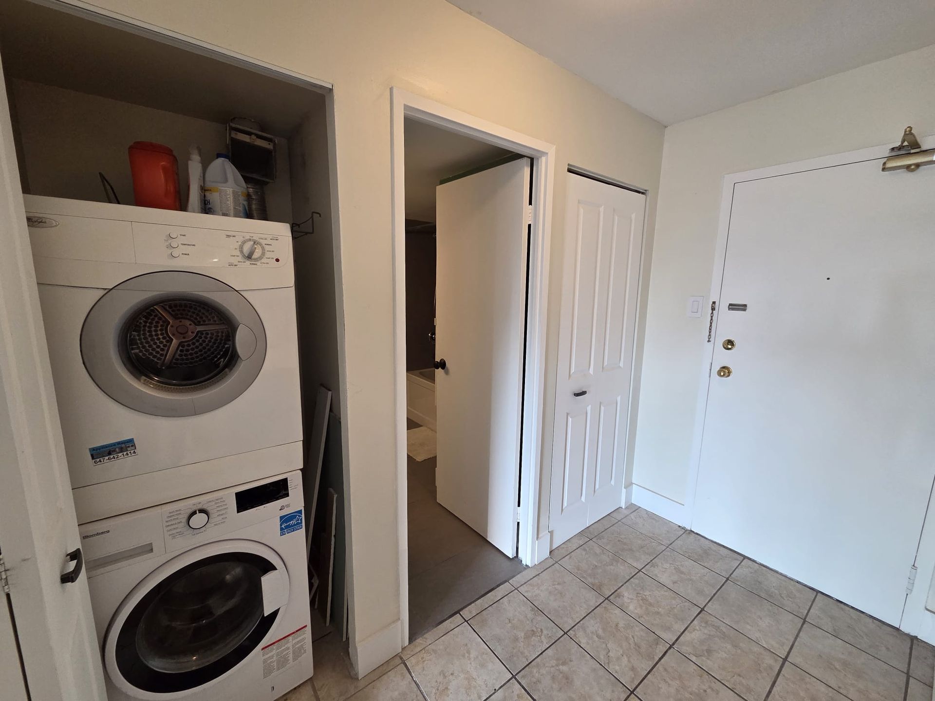 Laundry area with washer and dryer included, 1111 condo by Laura Cooper Realtor