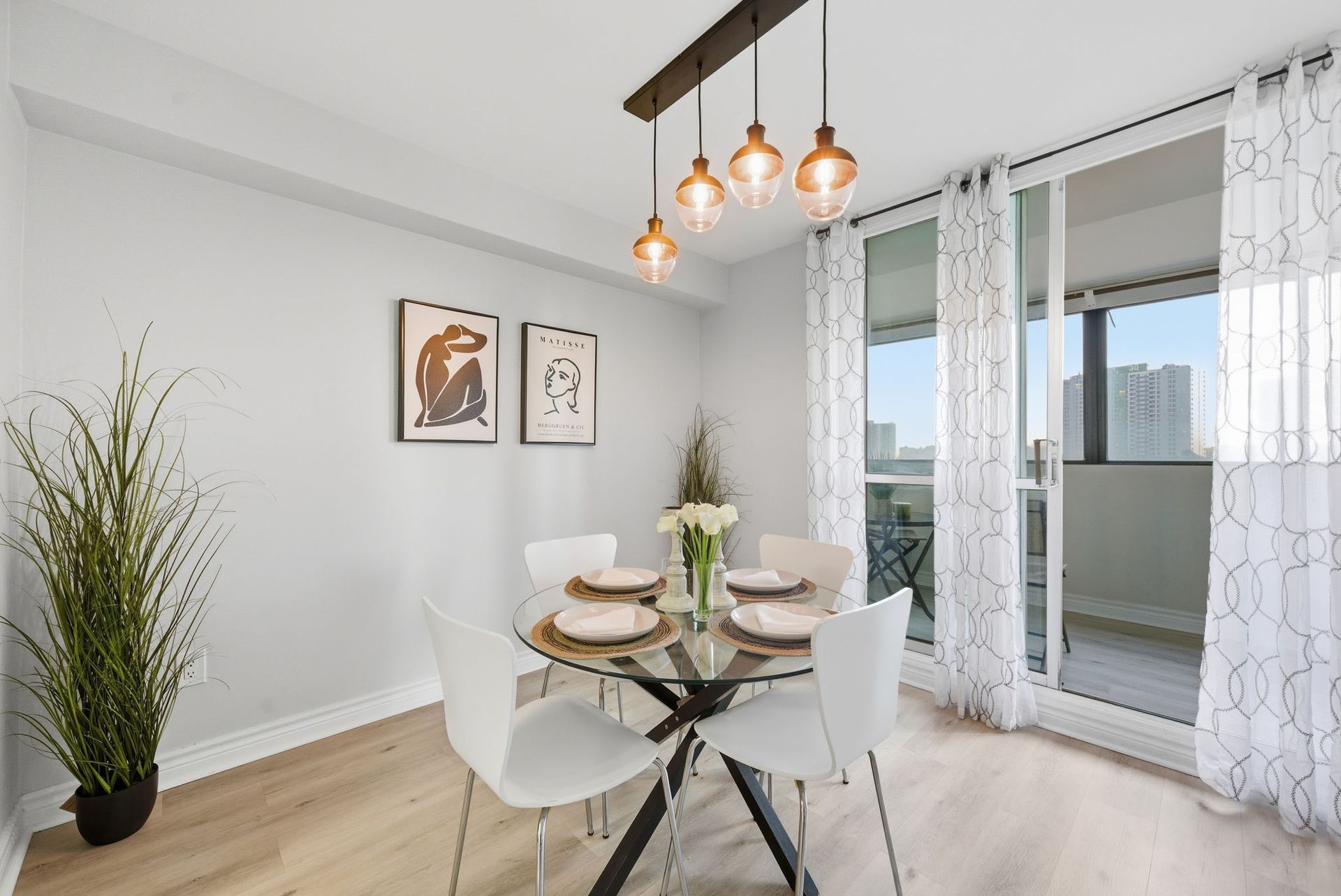 Dining area connected to open living space, Toronto condo by Laura Cooper Realtor