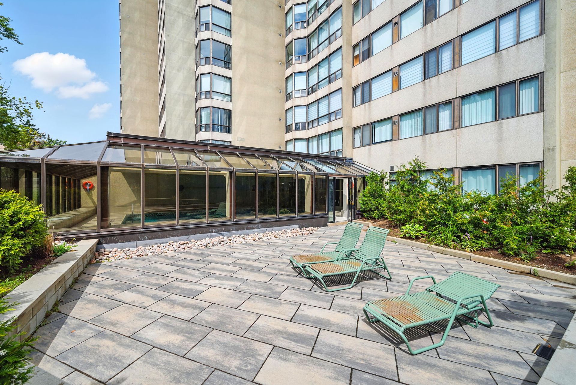Private courtyard or patio amenity area, listed by Laura Cooper Realtor