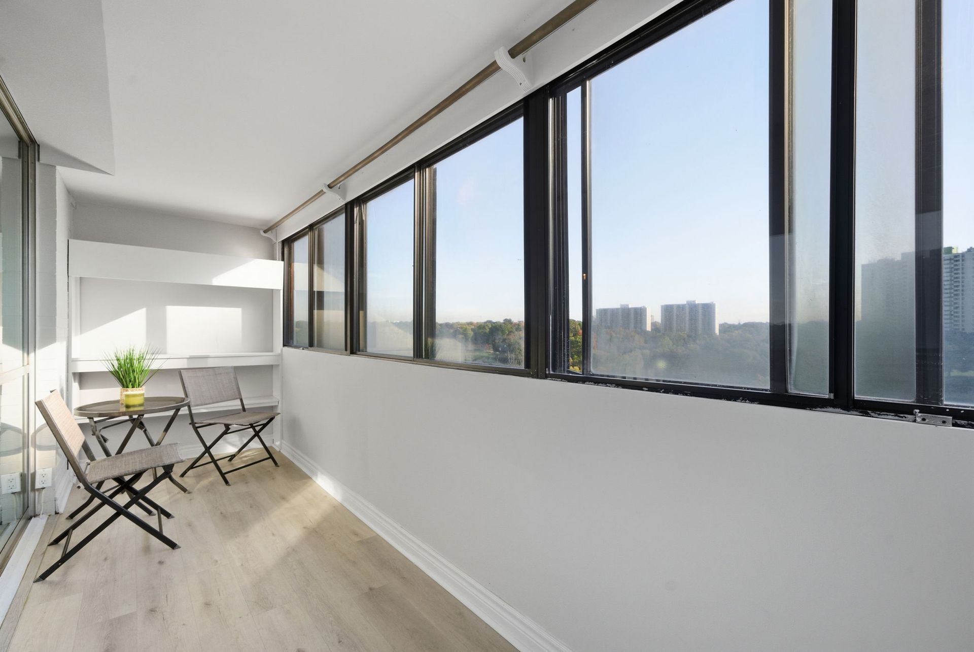 Enclosed solarium with green views, 5 Massey Square condo by Laura Cooper Realtor