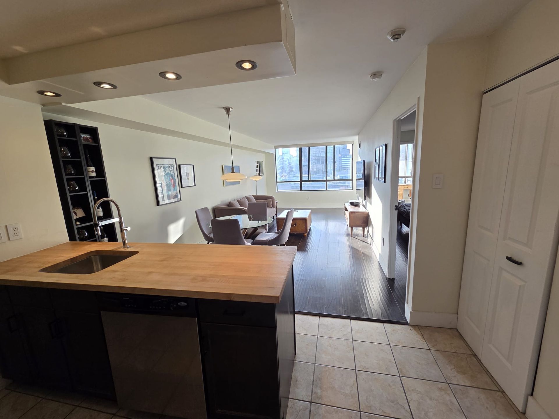 Kitchen with stainless steel appliances and breakfast bar, listed by Laura Cooper Realtor
